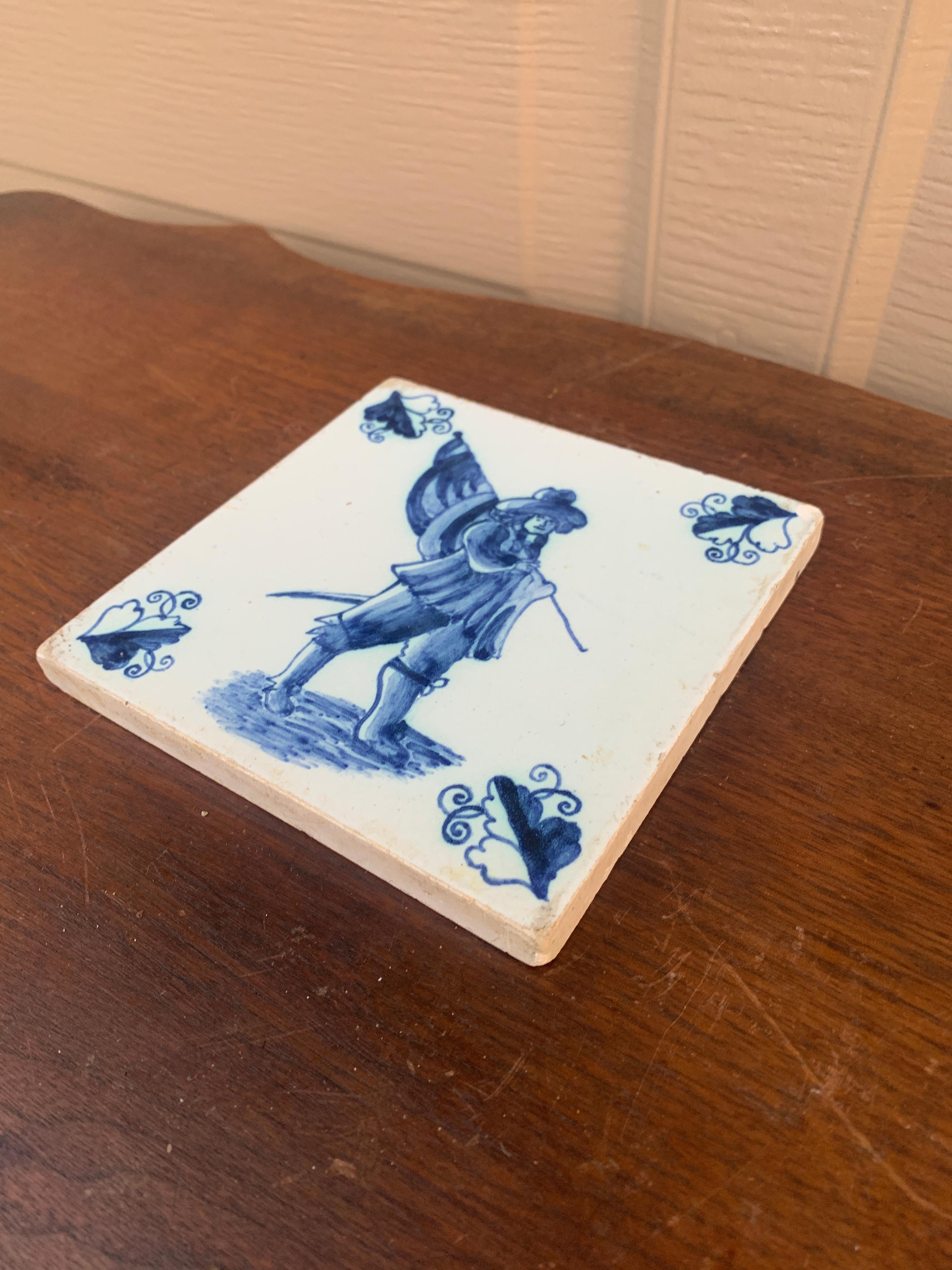 French Provincial Antique Dutch Delft Style Blue and White Tile Featuring a Soldier For Sale