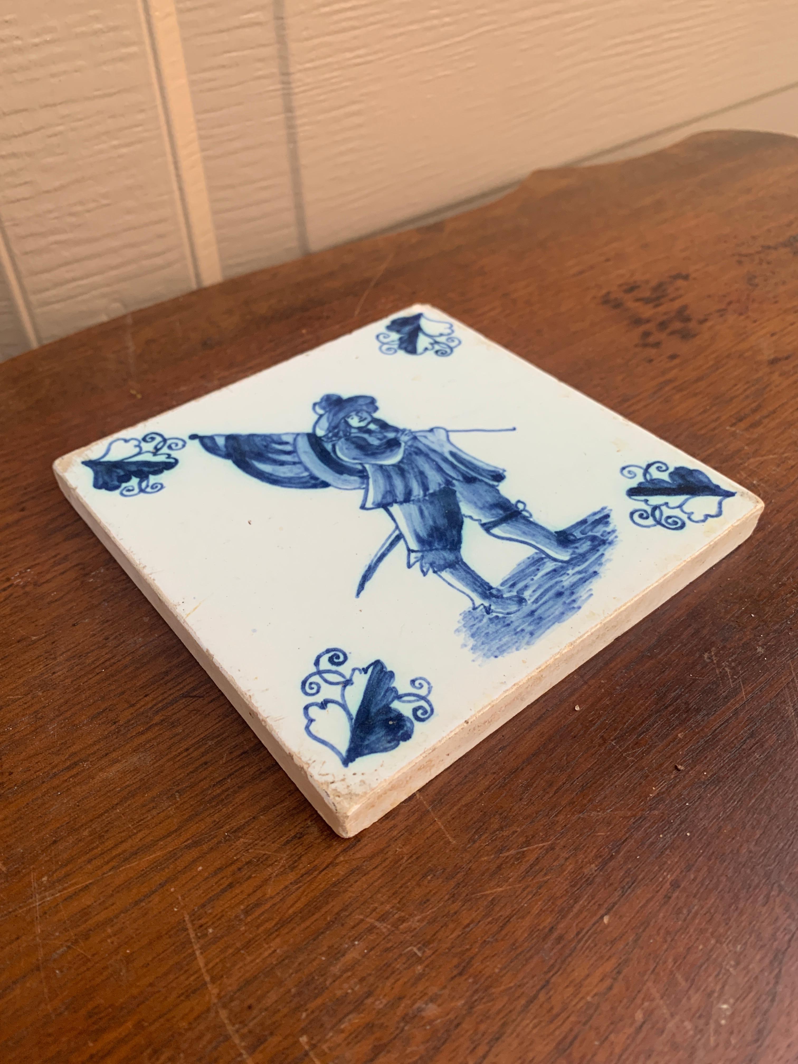 Antique Dutch Delft Style Blue and White Tile Featuring a Soldier In Good Condition For Sale In Elkhart, IN