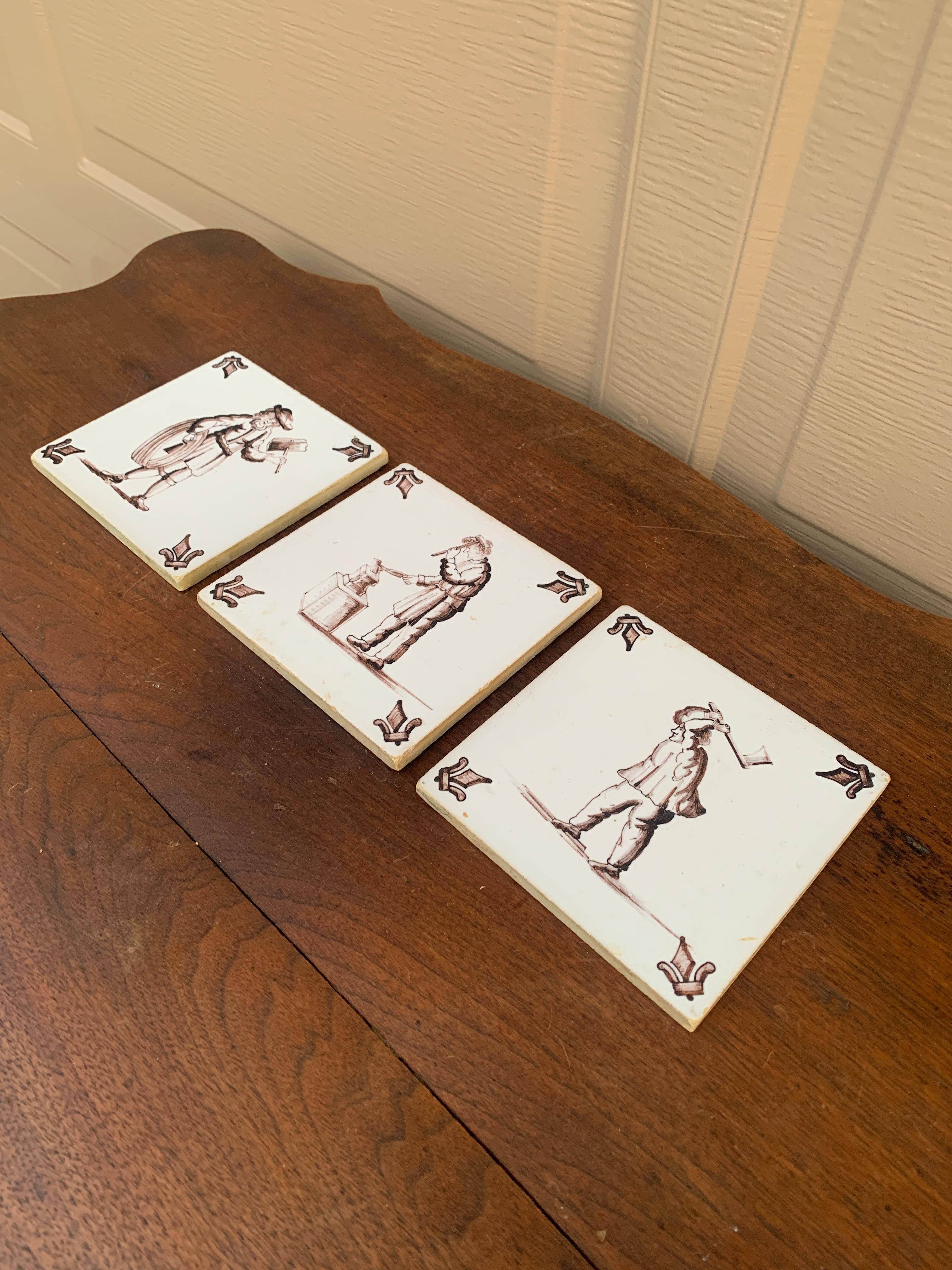 Dutch Colonial Antique Dutch Delft Style Craftsmen Brown and White Tiles, Set of Three For Sale