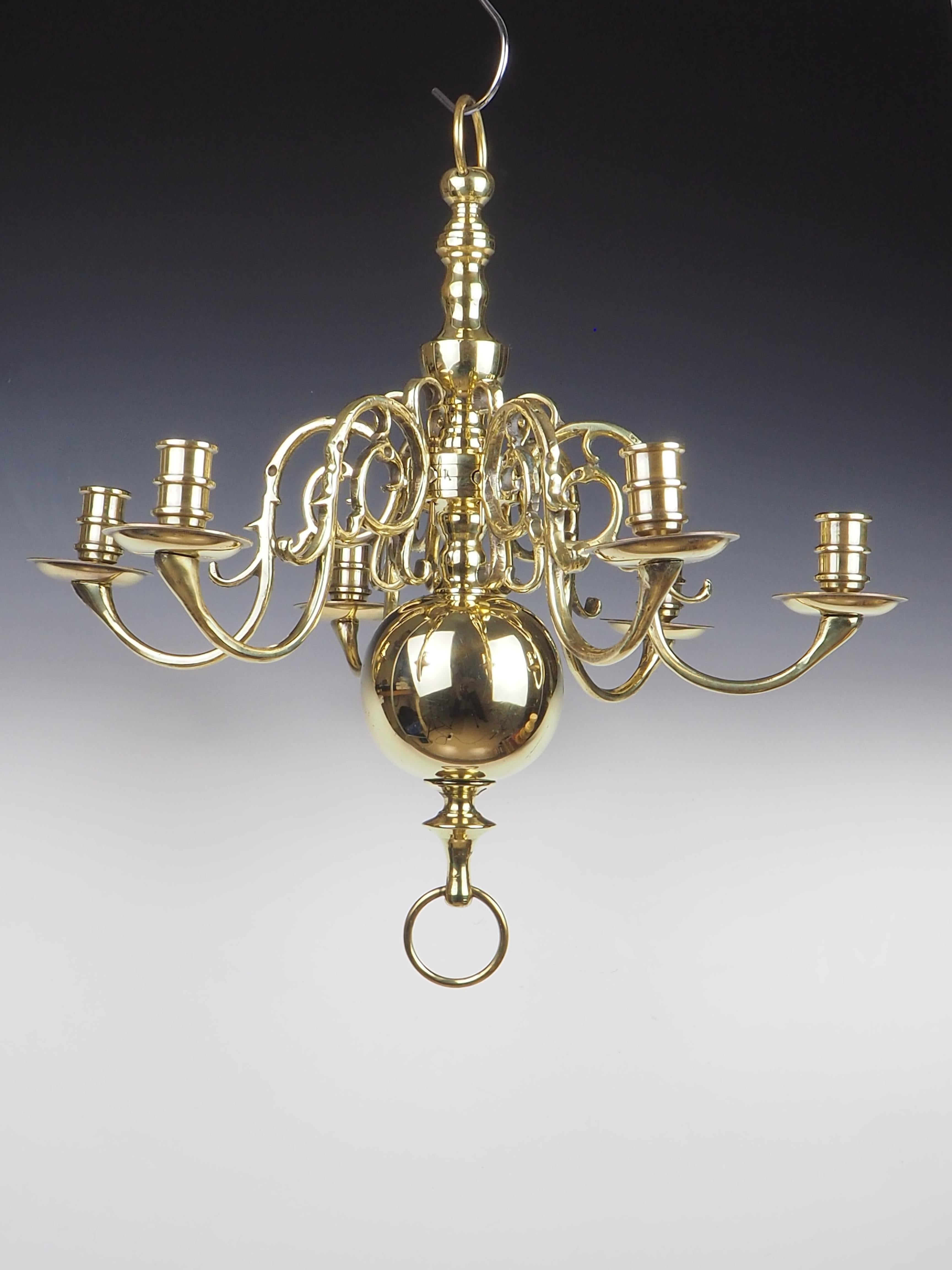 Antique Dutch Flemish Renaissance Chandelier (circa 1800)

This exquisite Dutch Flemish Renaissance chandelier, dating back to approximately 1800, is a magnificent testament to the exceptional craftsmanship and design aesthetics of its