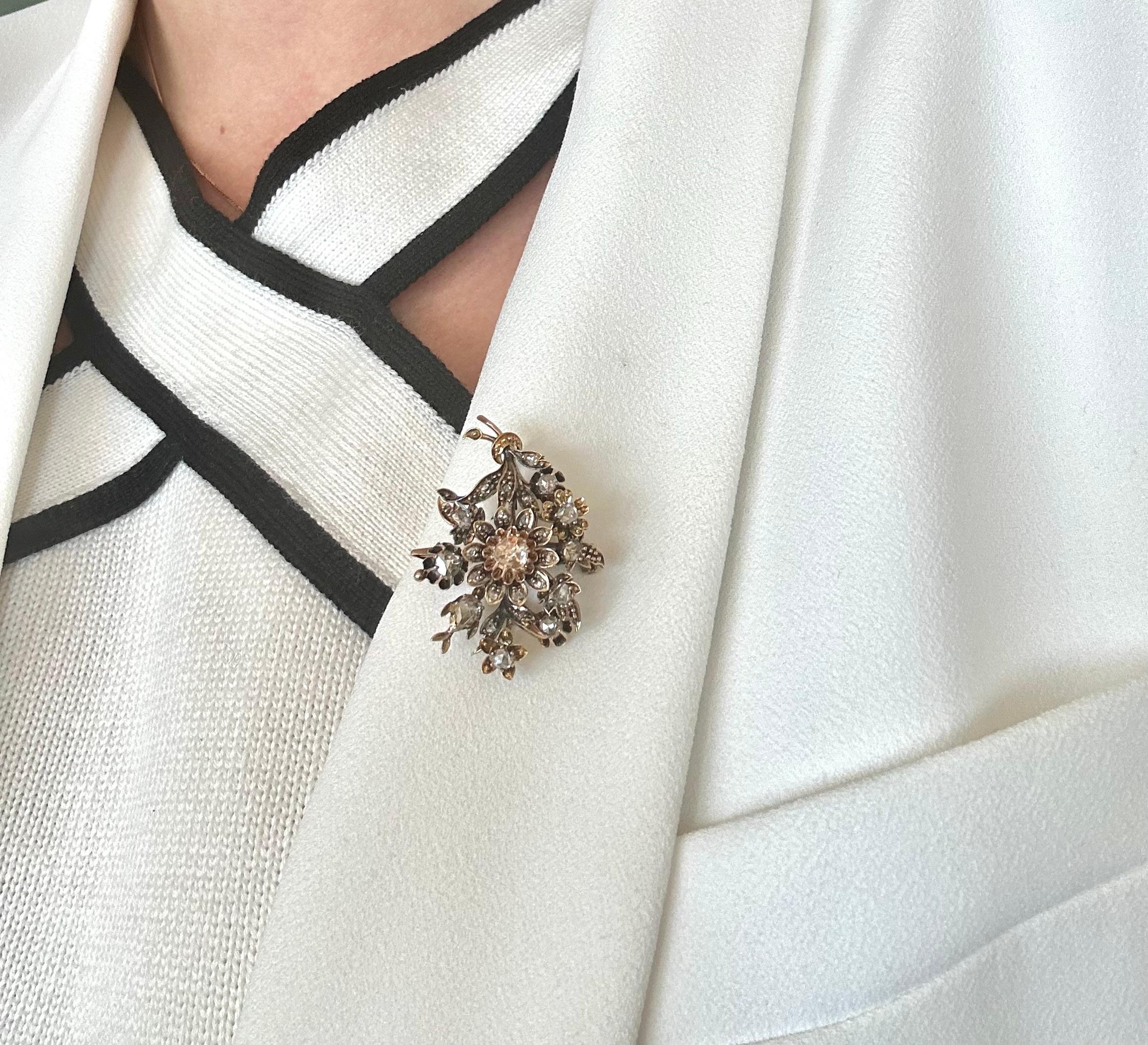 An antique brooch-pendant from the mid-19th century, set with 26 diamonds total 1,30ct in old Dutch rosette cuts.

Particularly fashionable in the mid-19th century in Europe, naturalism was manifested in jewelry by intricate reproduction of floral