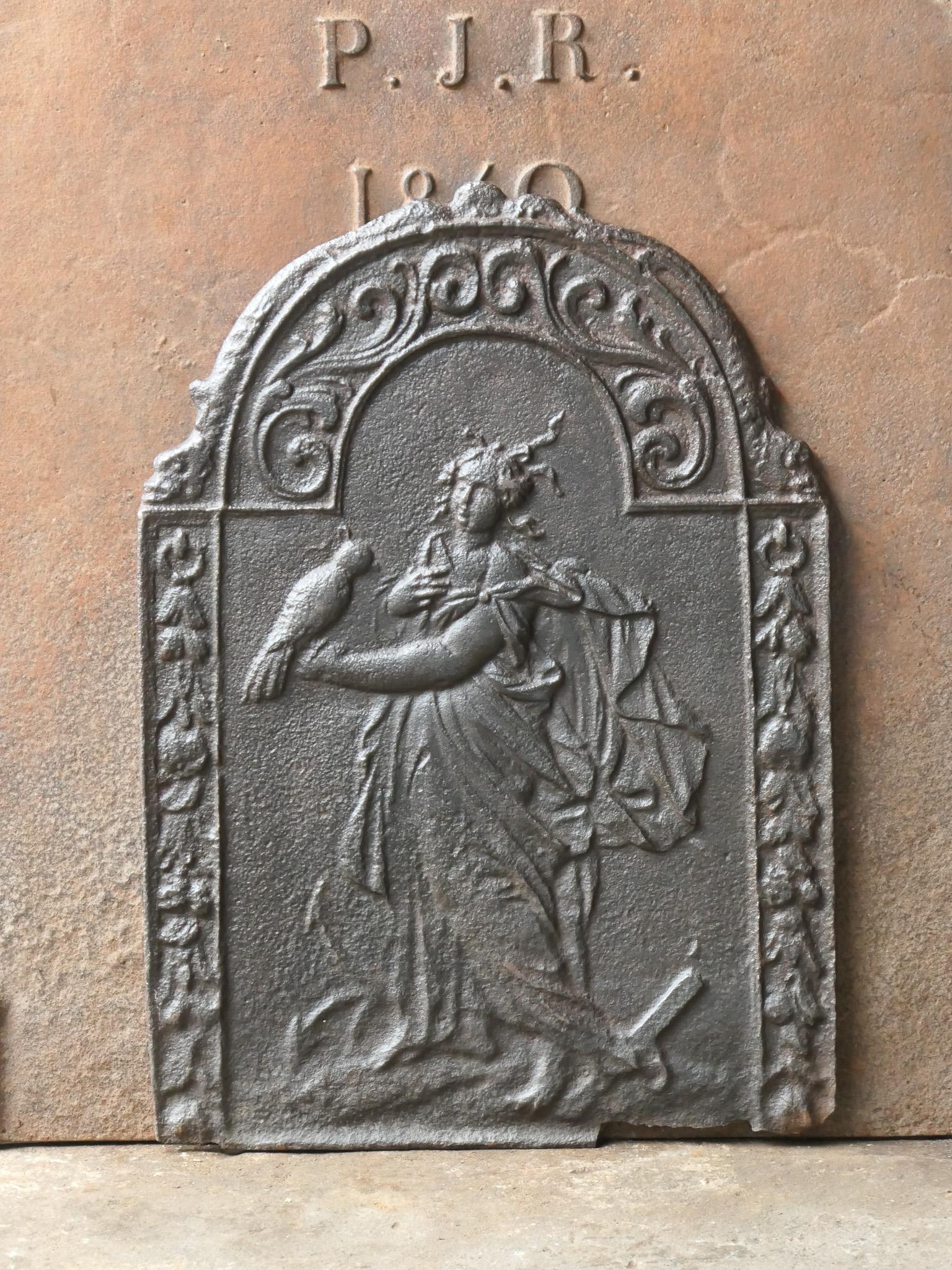 Beautiful 17th century Dutch fireback with an allegory of Hope. The fireback is from the Louis XIV period. Hope from the triptych faith, hope and love, the three theological virtues). The fireback has a natural brown patina and can be made black /
