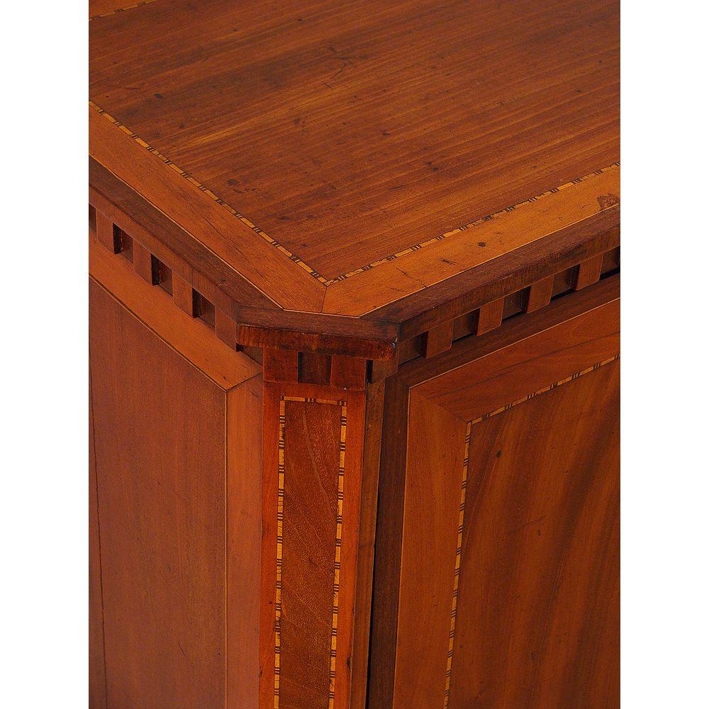 An antique Dutch mahogany side cabinet. Good color and original. Rare small size. 

This side cabinet is of unusually high quality demonstrating complicated inlays of various differing wood veneers. Note the dentil frieze.