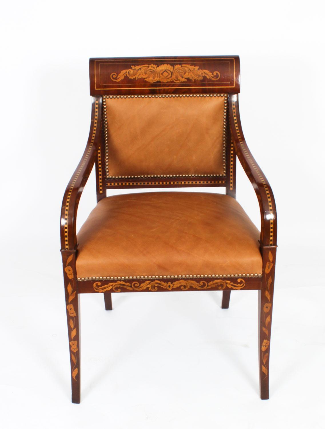 A beautiful antique Dutch Marquetry mahogany armchair, circa 1840 in date. The mahogany is a beautiful color and the marquetry decoration is of superb quality.

This  chair would be ideal for use with a desk, a card table or in a bedroom.

It has