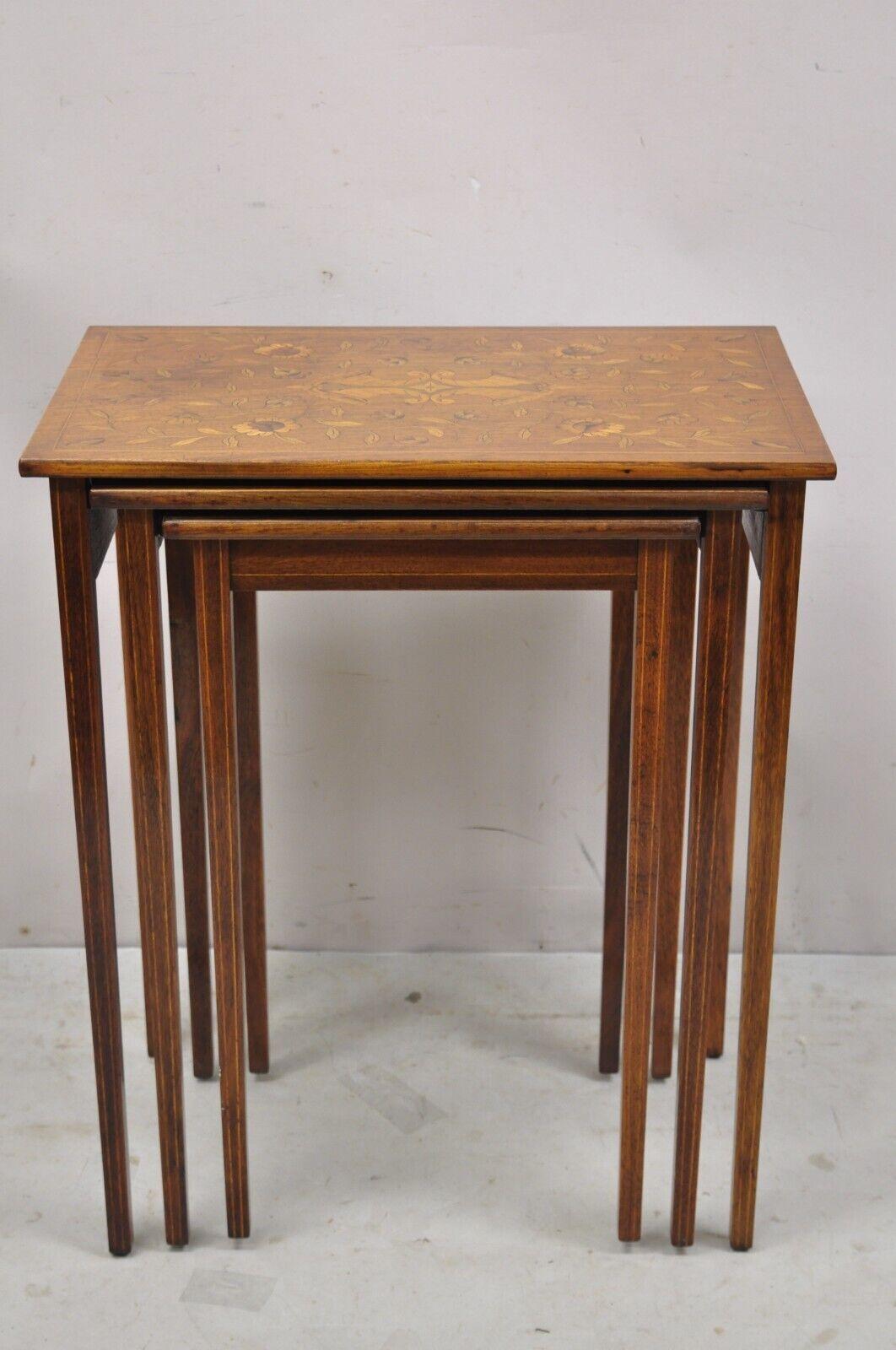 Antique Dutch Marquetry Inlay Mahogany nesting side tables - 3 Pc Set. Item features 3 graduating sizes, satinwood floral inlay, on all 3 tops, beautiful wood grain, tapered legs, very nice vintage set, great style and form. Circa Early