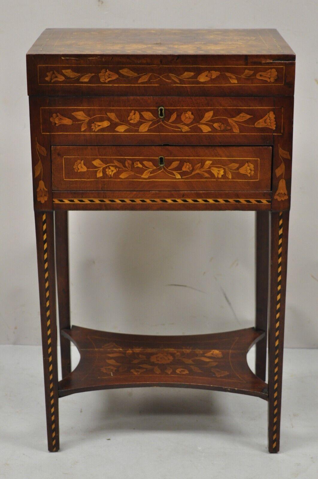 Antique Dutch Marquetry Inlay Mahogany Sewing Stand Side Table Nightstand. Item features lift top, floral and vine satinwood inlay throughout, lower shelf with inlay, no key, but unlocked, 1 dovetailed drawer. Circa 19th Century. Measurements: 27.5