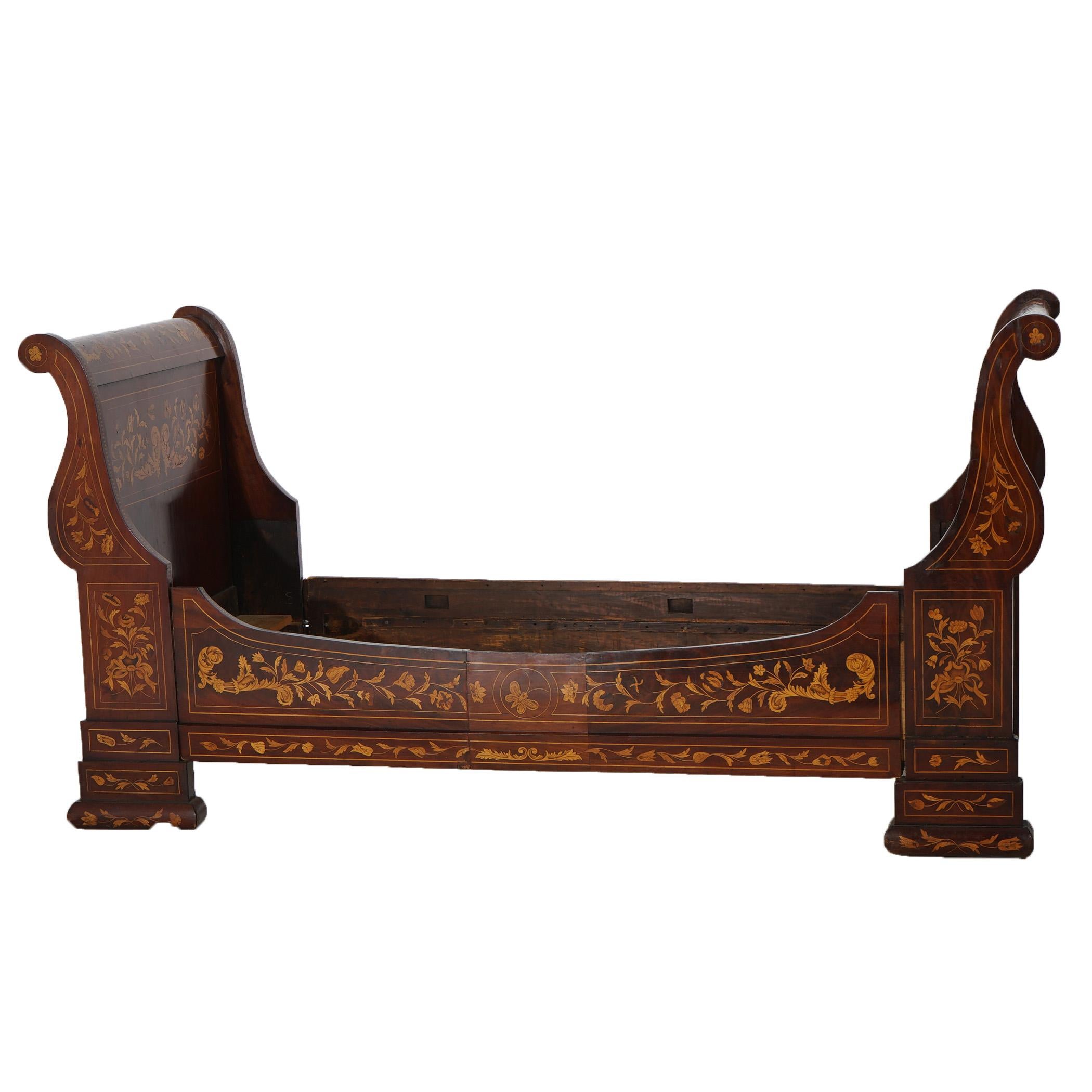 ***Ask About Lower In-House Shipping Rates - Reliable Service & Fully Insured***
An antique youth sleigh bed offers rosewood, mahogany and satinwood floral Dutch marquetry with footboard and headboard in scroll form, c1860

Measures - 44.5