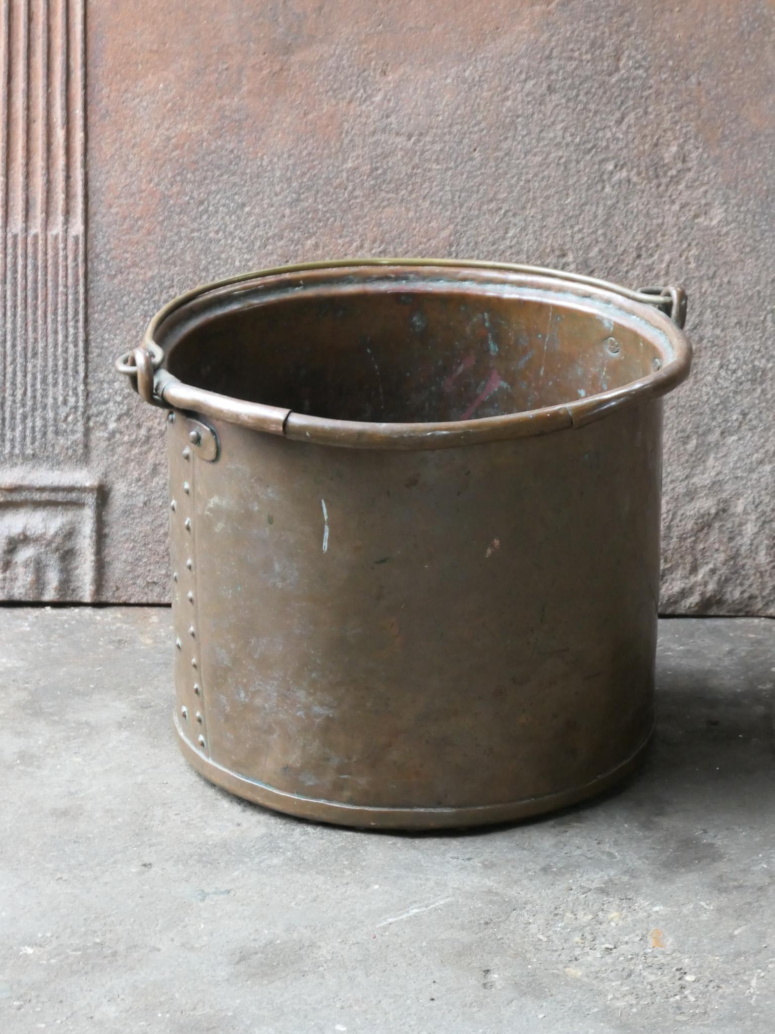19th century Dutch Napoleon III firewood basket holder. The log holder is made copper. Also called 'Frisian nail bucket'. Was used for the transport of milk.

The log holder is in a good condition and is fully functional.