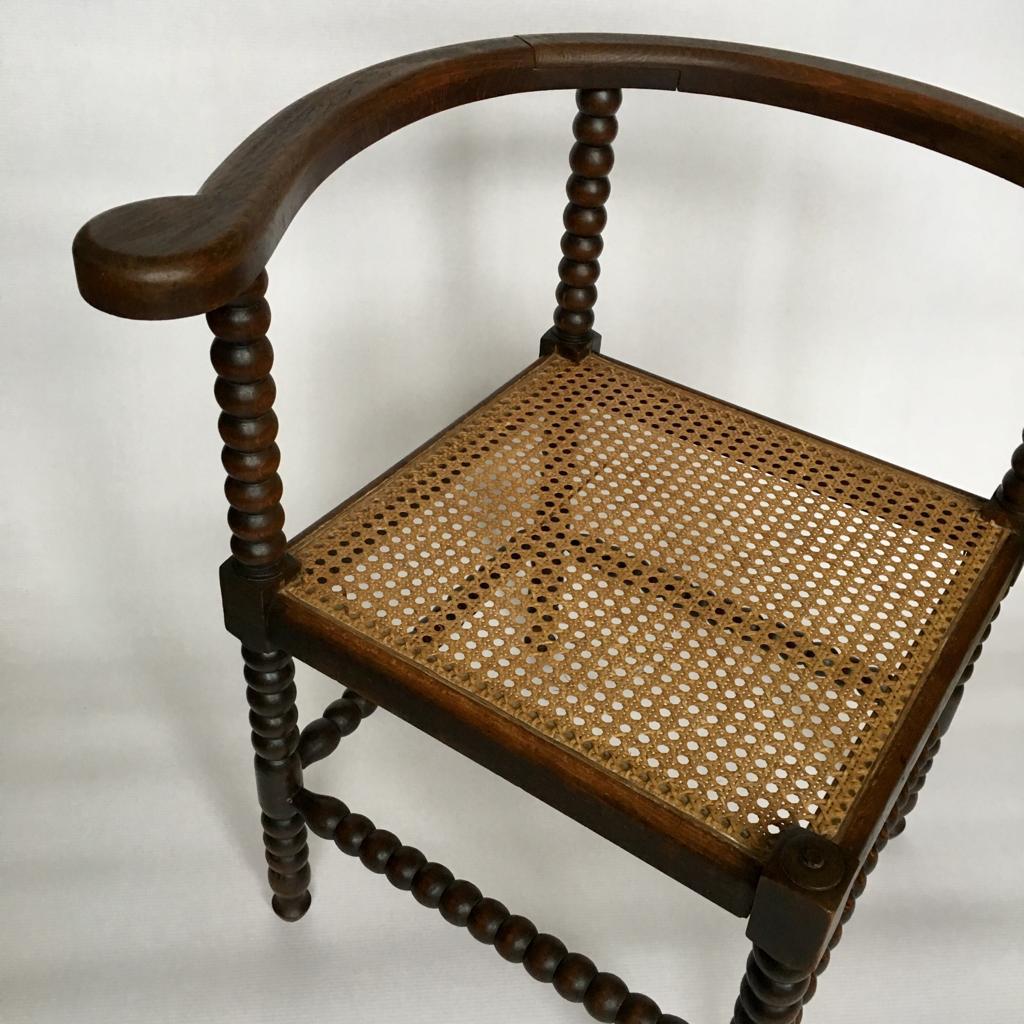 Antique Dutch Oak Corner Chair with Cane Seat, 1900s (20. Jahrhundert)