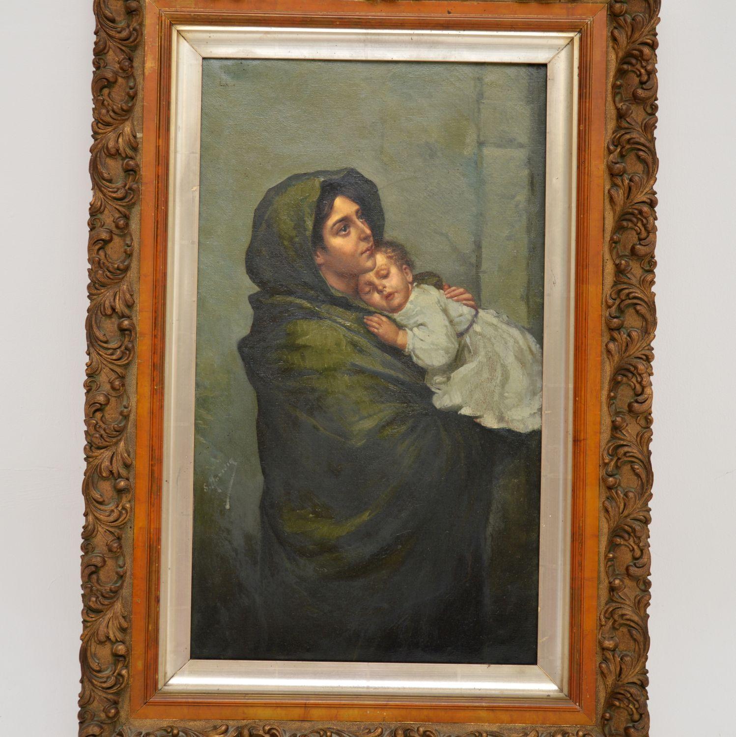 A beautifully executed antique Dutch oil painting in a gilt wood frame, depicting a mother and baby, dating from around the 1860-1880 period.

It is a beautiful and touching subject, executed with great skill and it is signed by the artist, though