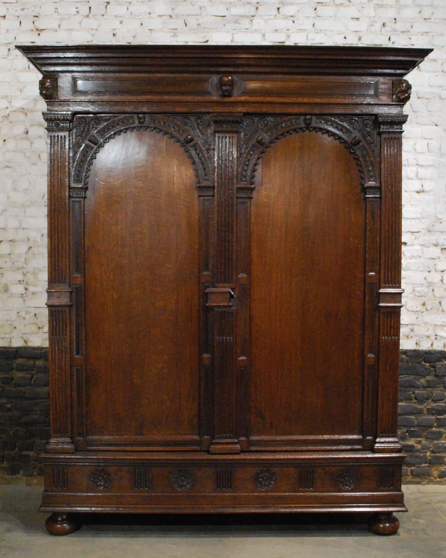 This rare Dutch cabinet is made of the finest oak in the tradition of the Dutch Renaissance during the “Dutch golden age” 
This cabinet is made in the Provence of Utrecht, circa 1730. The arched doors are typical for this province and this type of