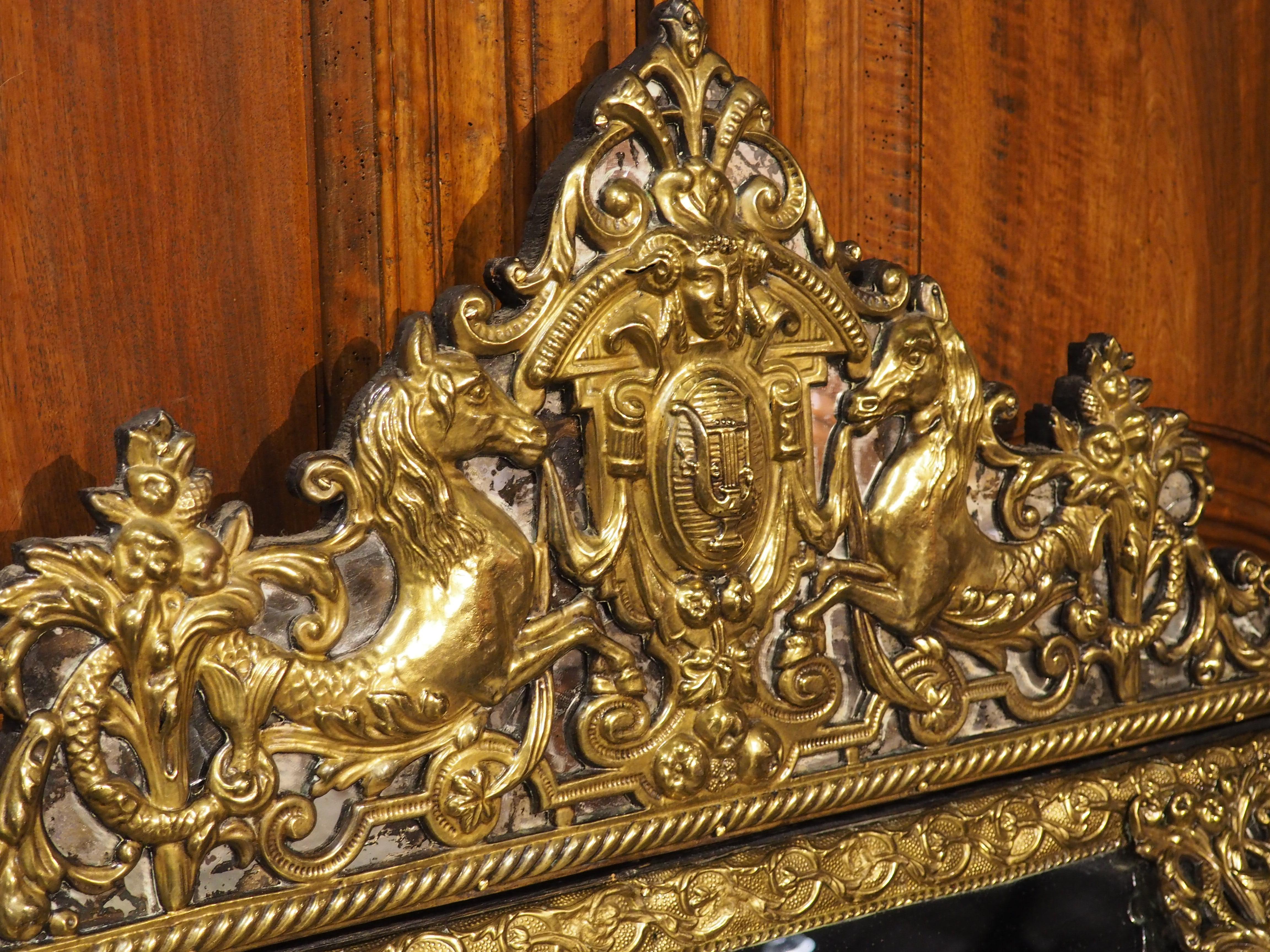 Repoussé Antique Dutch Repousse Cushion Mirror with Lyre and Seahorse Ornamentation