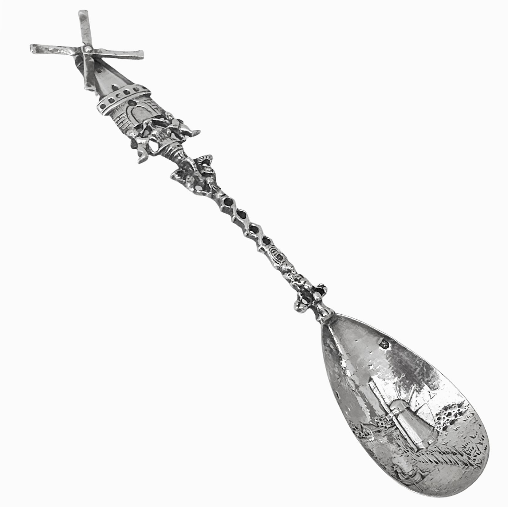 Antique Dutch Silver figural Spoon Dutch scene bowl Amsterdam 1903. Depicting at the top a windmill with a standing child on either side below, twist stem and further figural scene to lower part of stem. Lengths: 8.75 inches. Weight: 68 grams. Dutch
