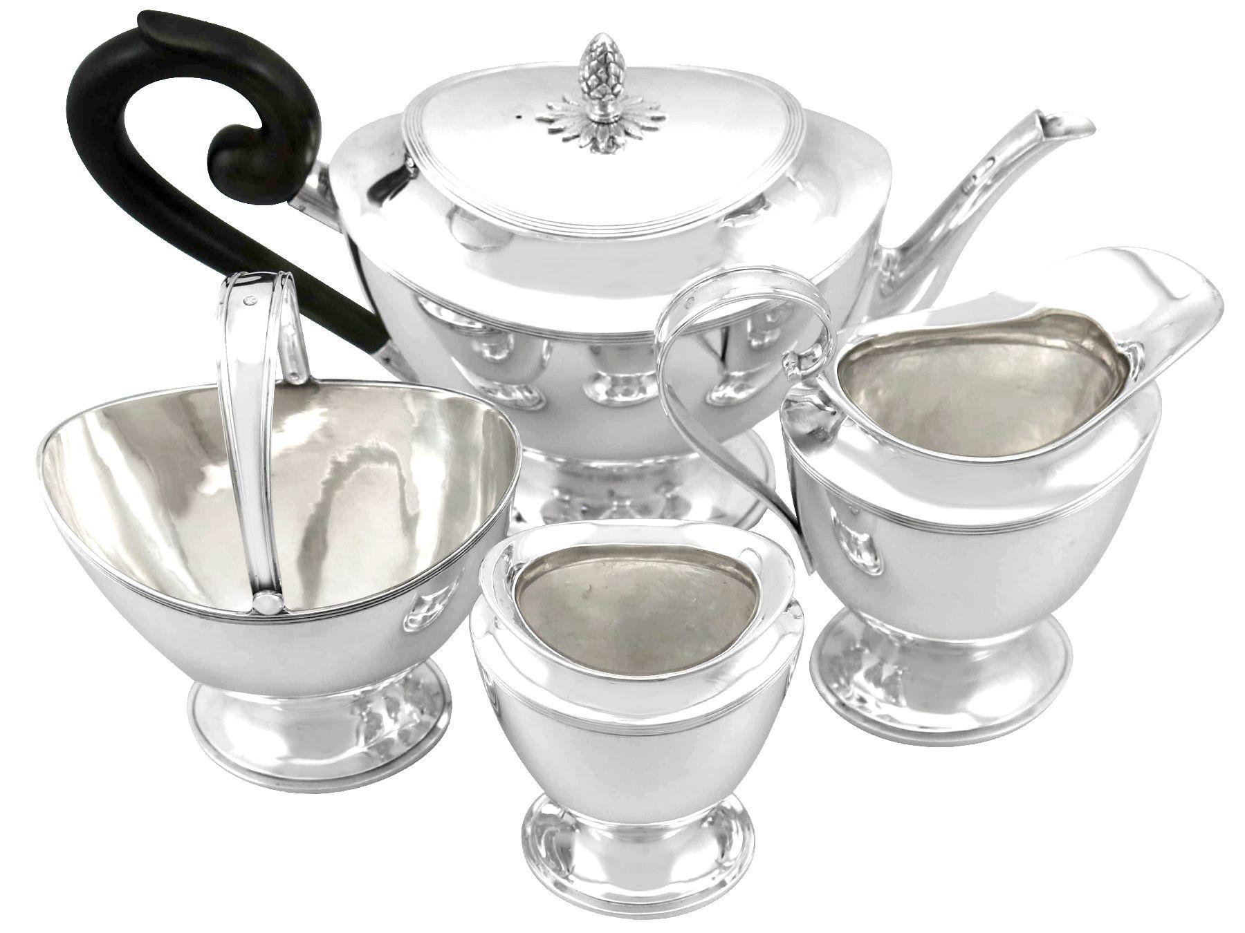 An exceptional, fine and impressive antique Dutch silver four piece tea set; part of our silver teaware collection

This exceptional antique Dutch silver tea and coffee set consists of a teapot, cream jug, sugar basket and slop bowl.

Each piece