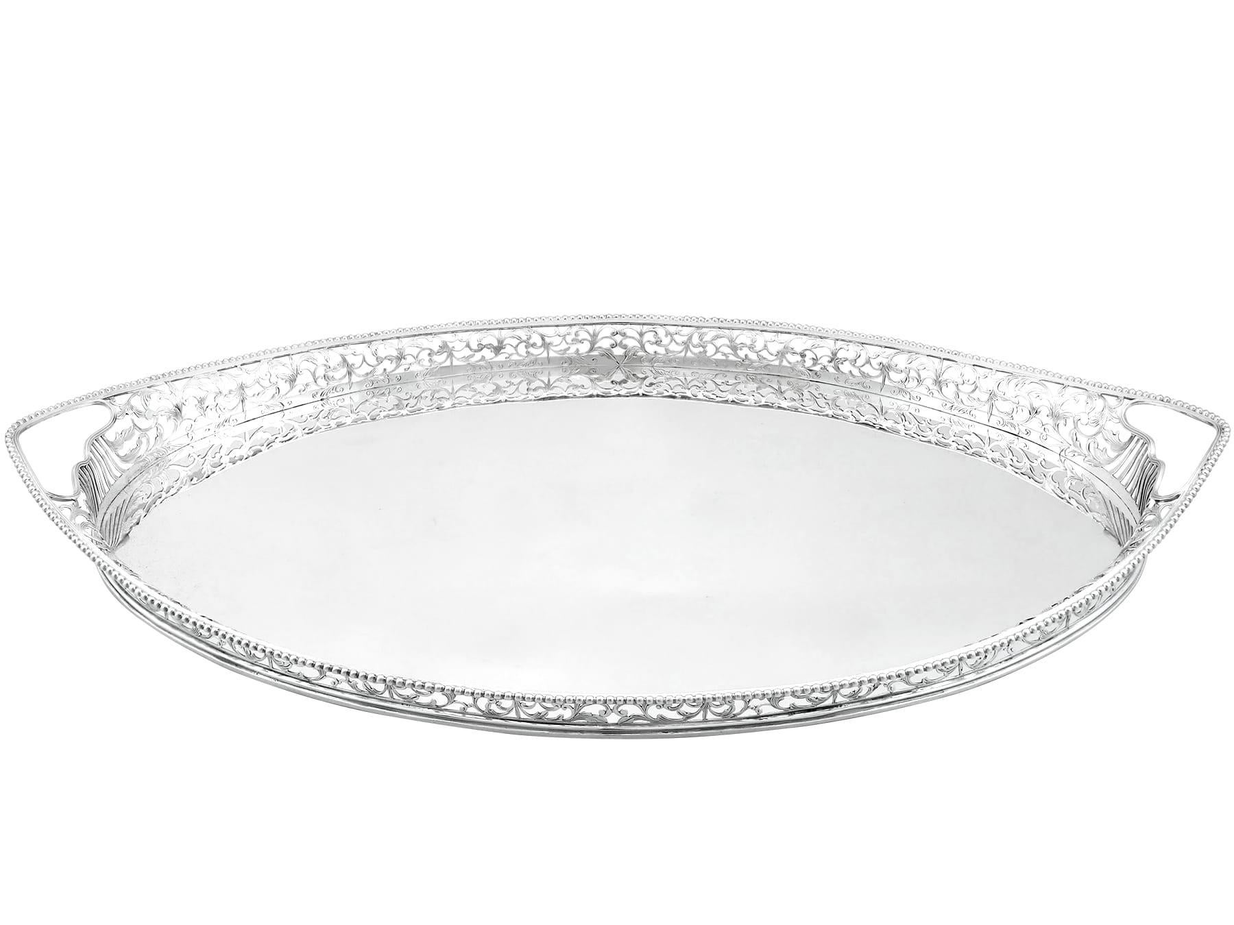 An exceptional, fine and impressive antique Dutch silver gallery tray; an addition to our dining silverware collection.

This exceptional antique Dutch silver tray has a plain oval form.

The surface of this antique tray is plain and