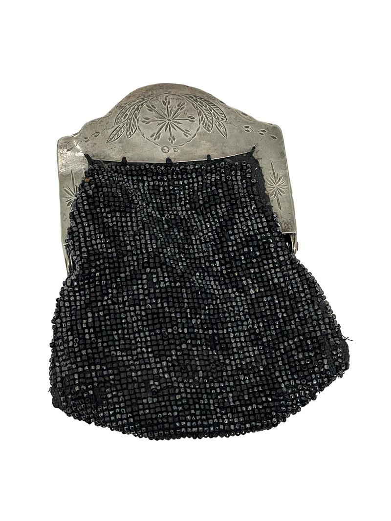Antique Dutch Silver Purse Mount beaded bag by Ringenoldus, ca 1830

An antique purse mount with black beaded bag. The silver mount with motif of a Lion in medallion. Dutch silver hallmarked with the 