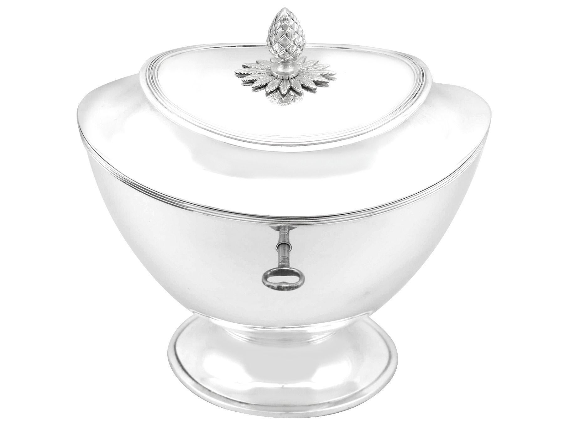 An exceptional, fine and impressive antique Dutch silver tea caddy; an addition to our silver teaware collection.

This exceptional antique Dutch silver tea caddy has an oval urn shaped form onto an oval pedestal foot.

The surface of this 19th