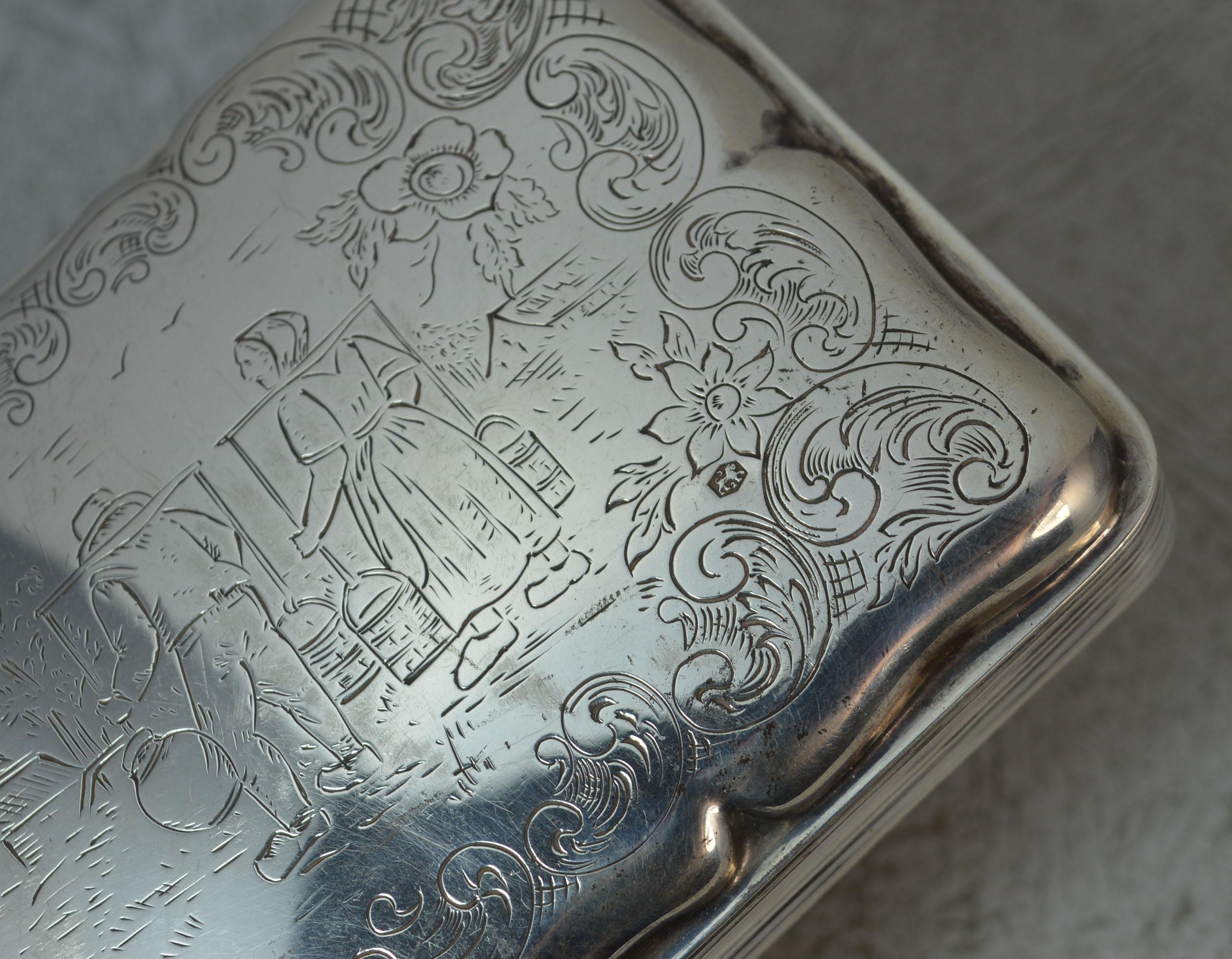 A very impressive Dutch silver snuff box.
Oversized example.
Stylish shape with farming scene to centre with floral engraved surround.

Hallmarks ; to each side, test mark to reverse
Weight ; 208 grams
Size ; 12.6cm x 8cm x 2.8cm approx
Condition ;