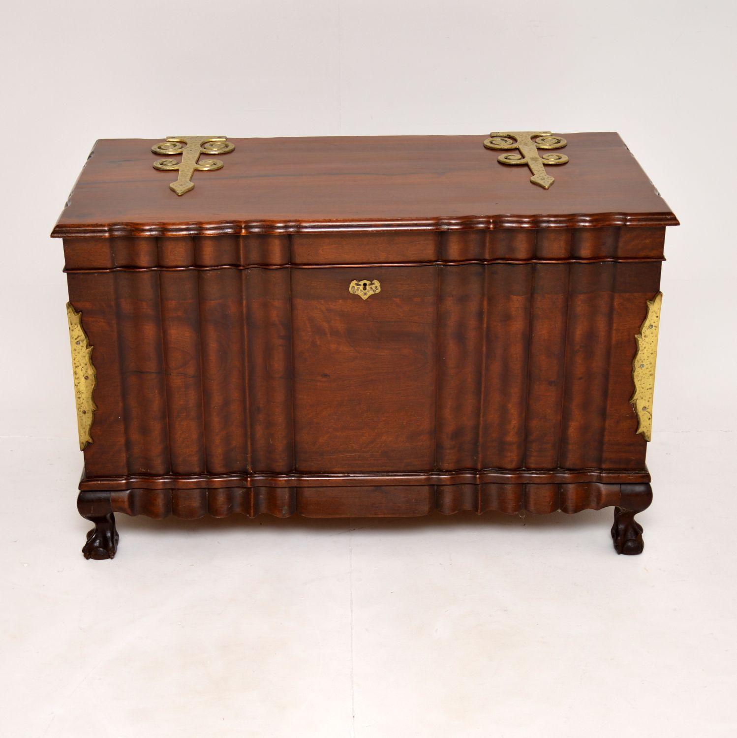 An impressive and very well made antique solid walnut and brass trunk. I think this made in Holland & would date it from around the 1920-30’s period.

The quality is amazing, this is very well designed and solidly built. The walnut has a beautiful