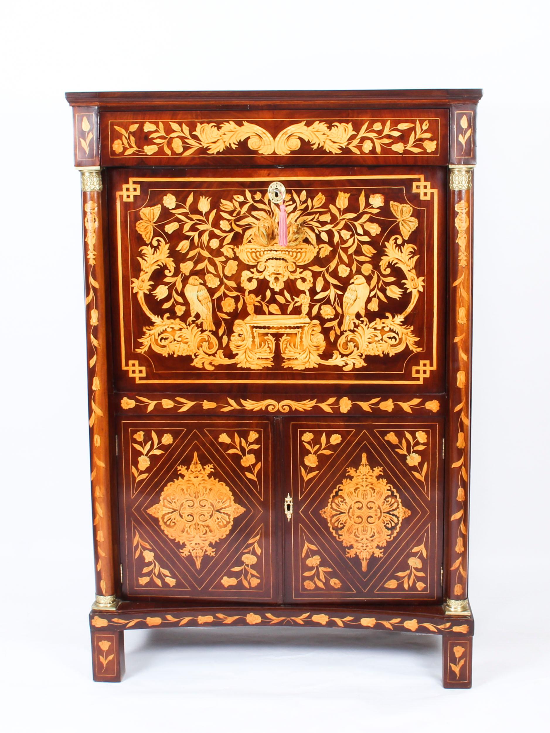 This is an impressive antique Dutch marquetry walnut secretaire à Abattant - fall front desk, which dates from circa 1780.
This impressive antique Dutch walnut secretaire is exquisitely adorned with a plethora of intricate marquetry decoration