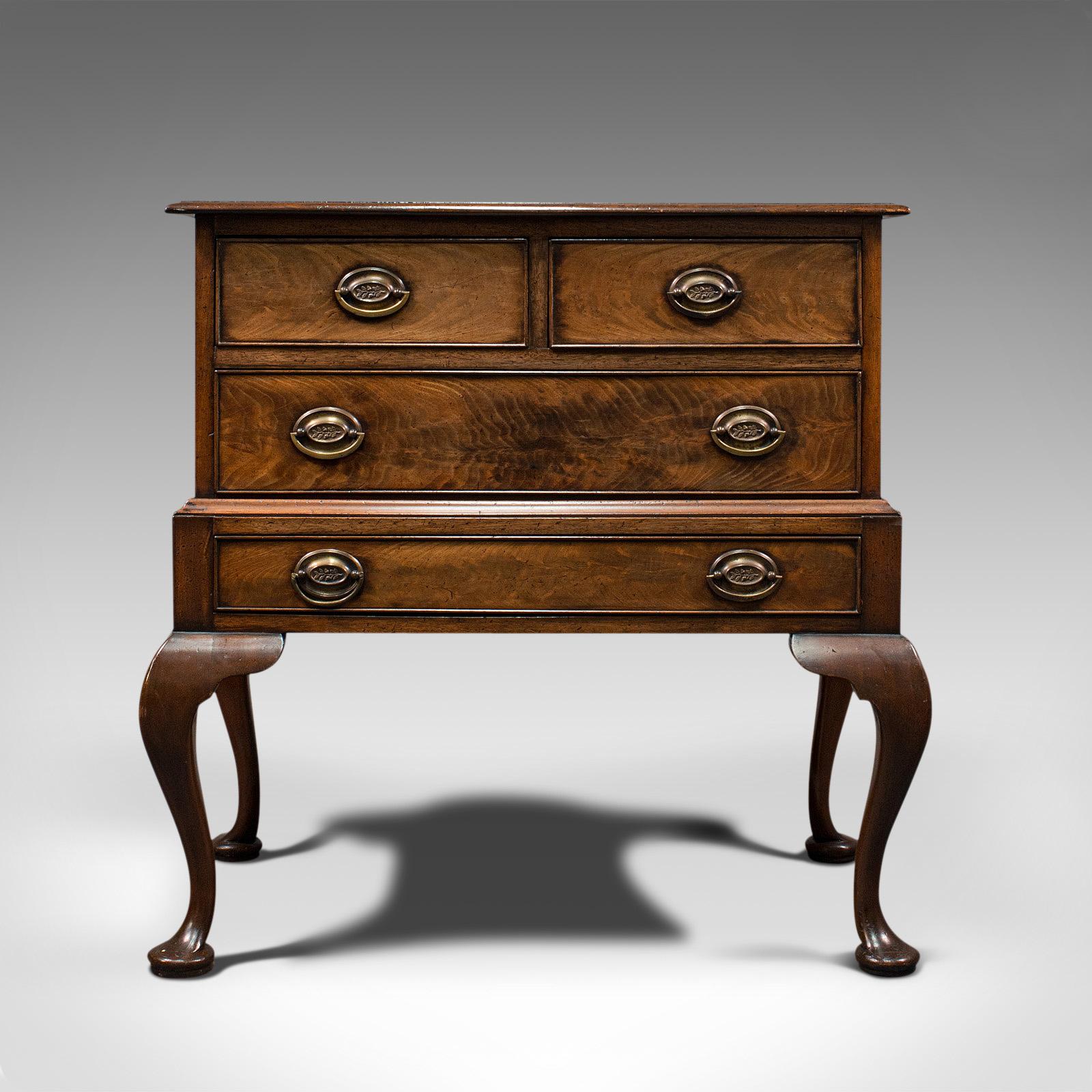 This is an antique dwarf chest on stand. An English, flame mahogany chest of drawers, dating to the late Victorian period, circa 1900.

Elegant raised chest of drawers with superb figuring
Displaying a desirable aged patina and in good
