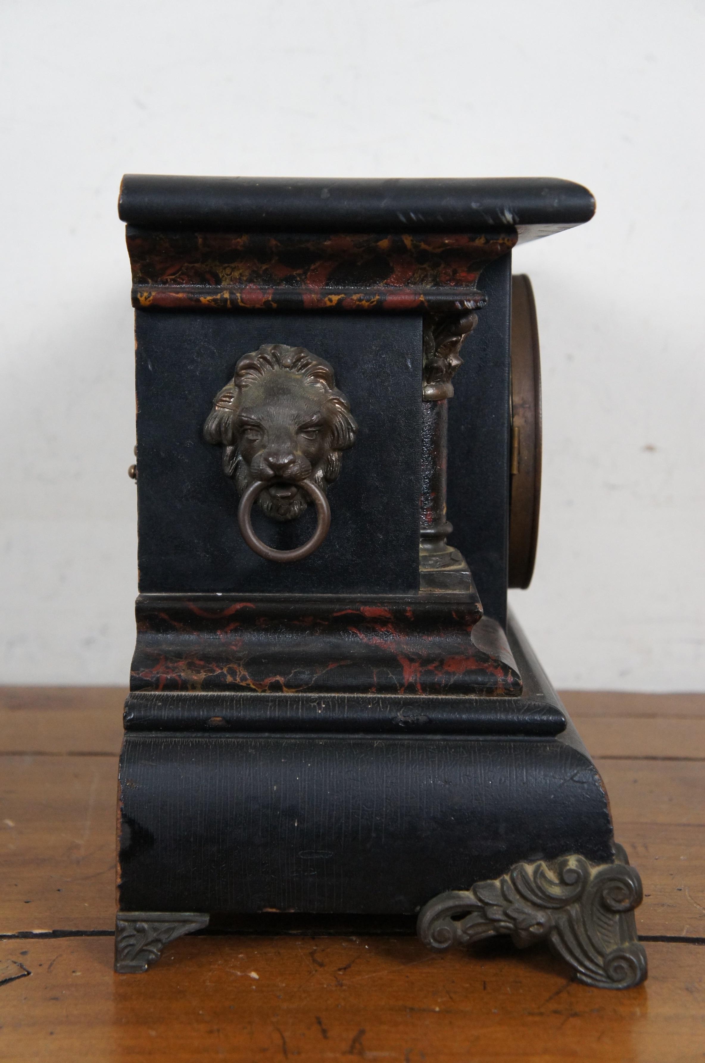 Antique E. Ingraham Chiming 8 Day Ebonized Faux Marble Lion Mantel Clock In Good Condition In Dayton, OH