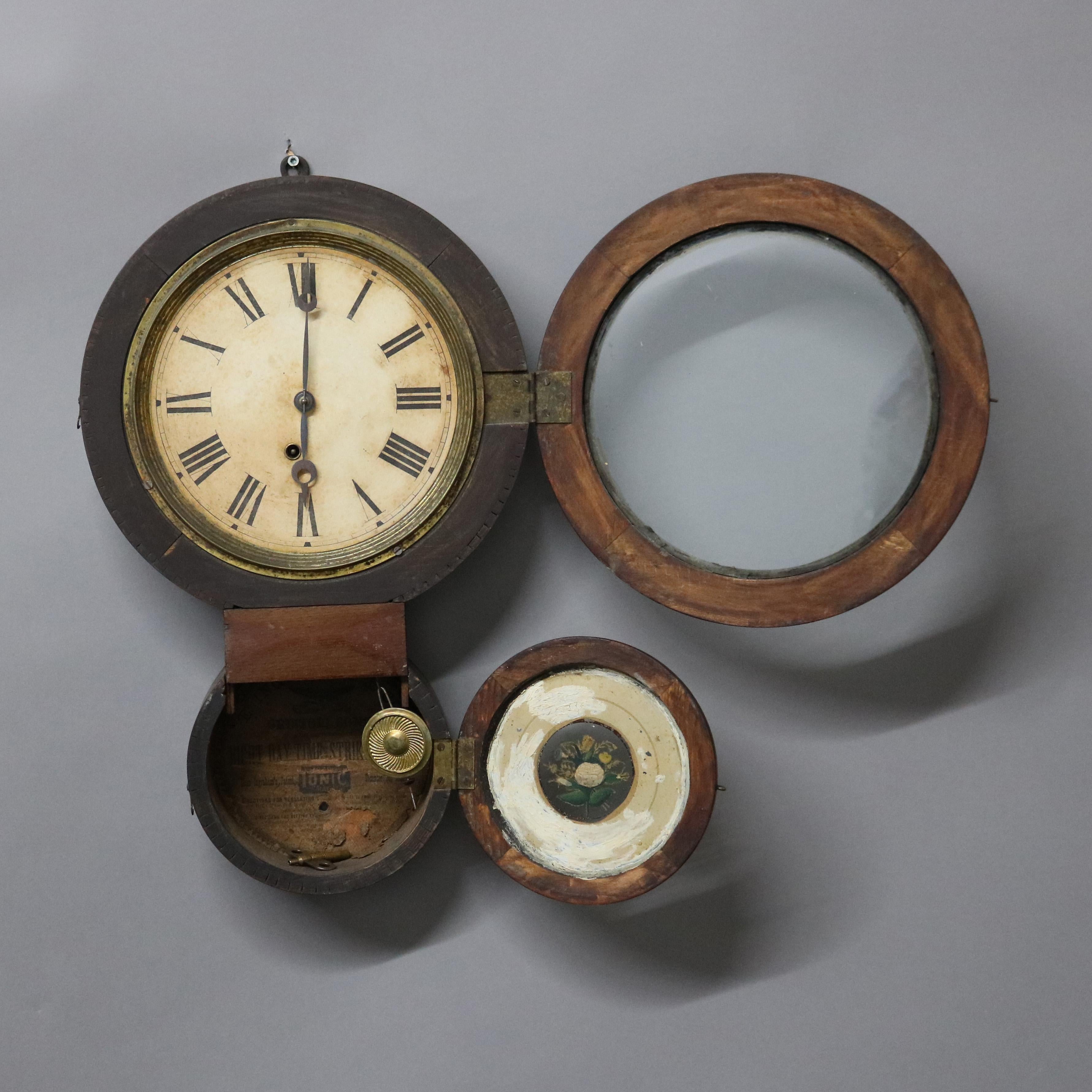 Antike E. Ingraham und Co. Rosenholzfigur Acht-Wanduhr C1881

Maße - 22,5 