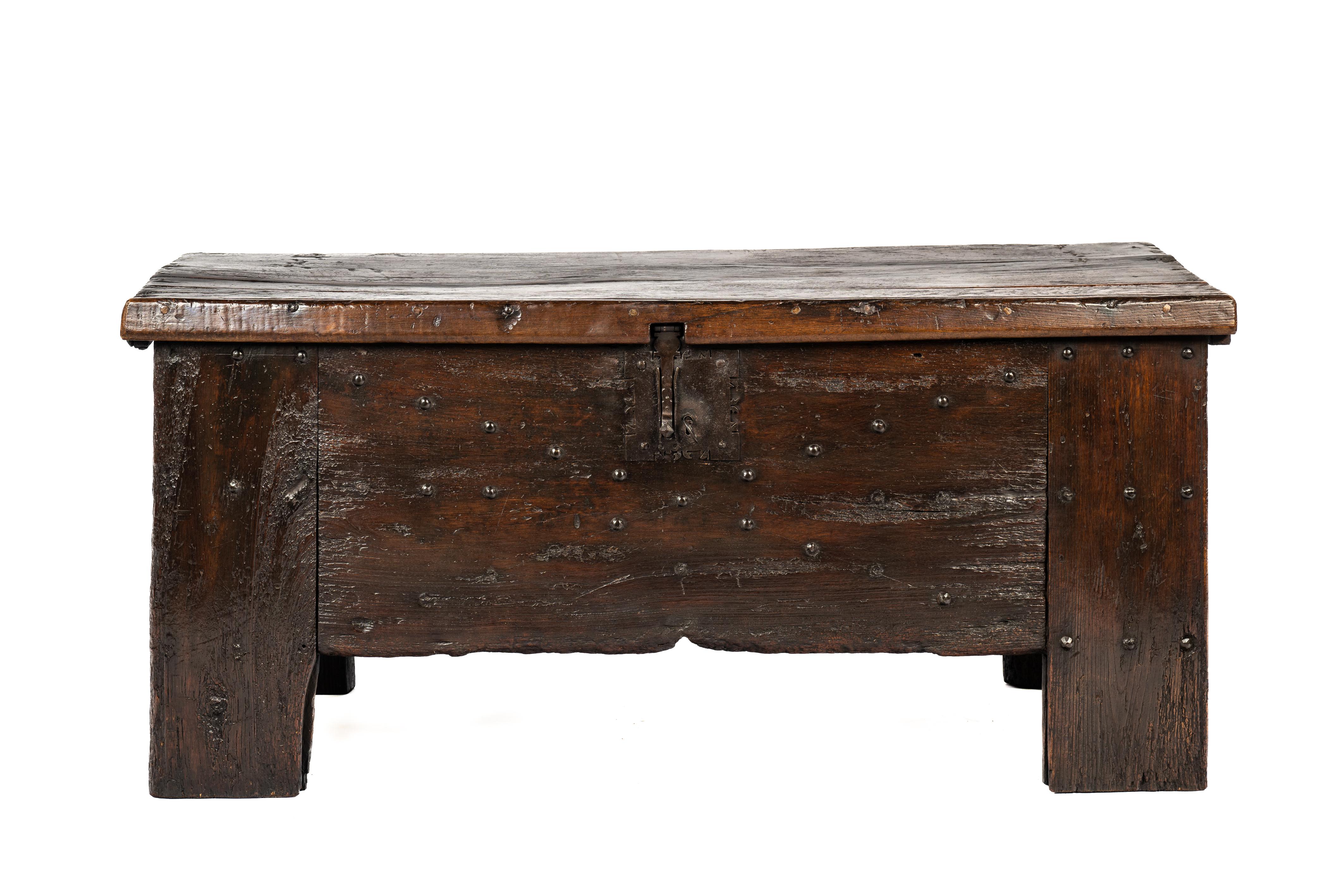 On offer here is an antique early 17th century Trunk or chest that was made in Northern Spain in the 1620s. The trunk was composed of boards of thick solid boards of chestnut wood. The trunk or case piece was enriched with steel forged steel nails