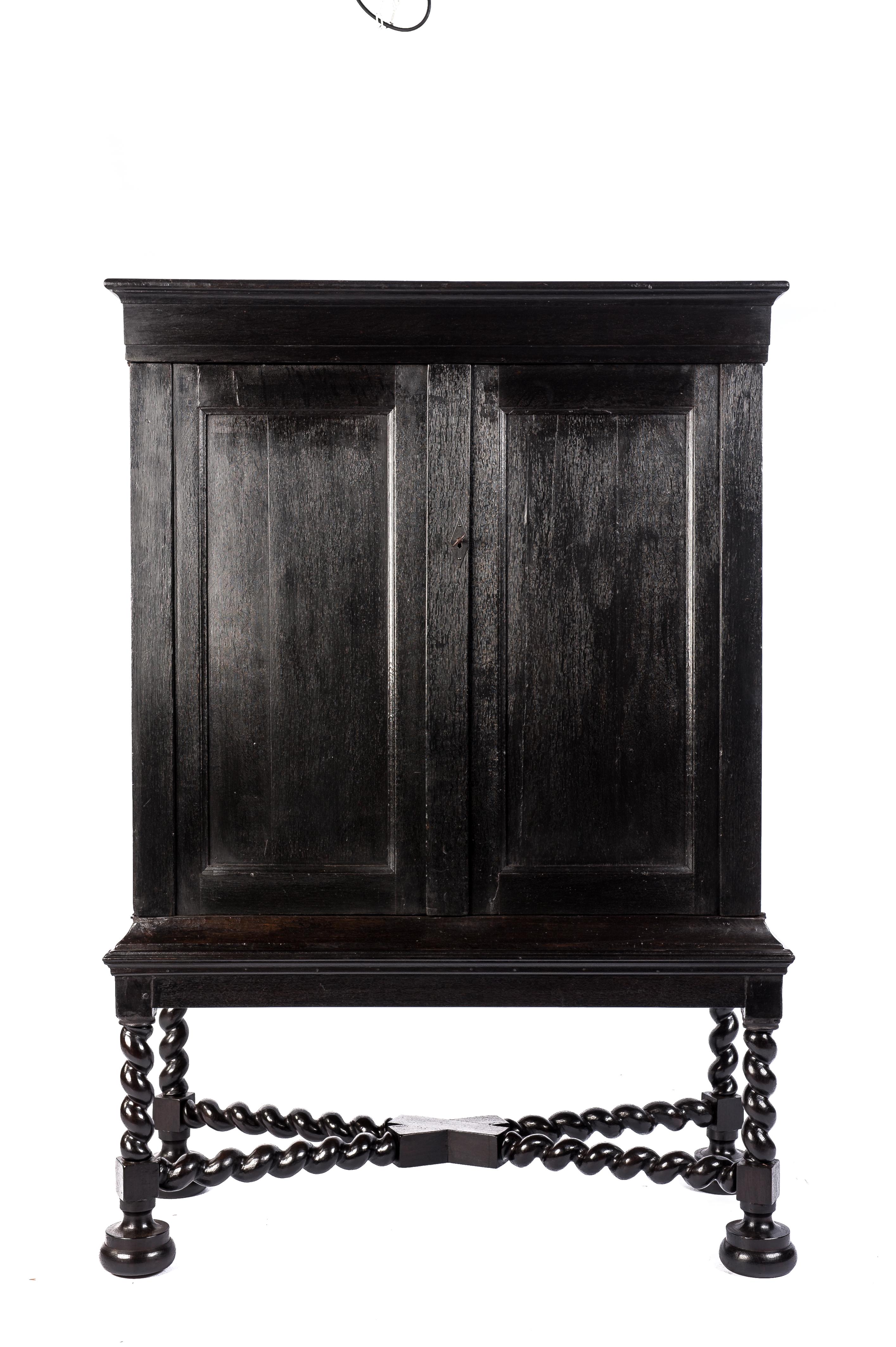 Polished Antique Early 18th Century Dutch Black Oak Renaissance Two-Door Cabinet