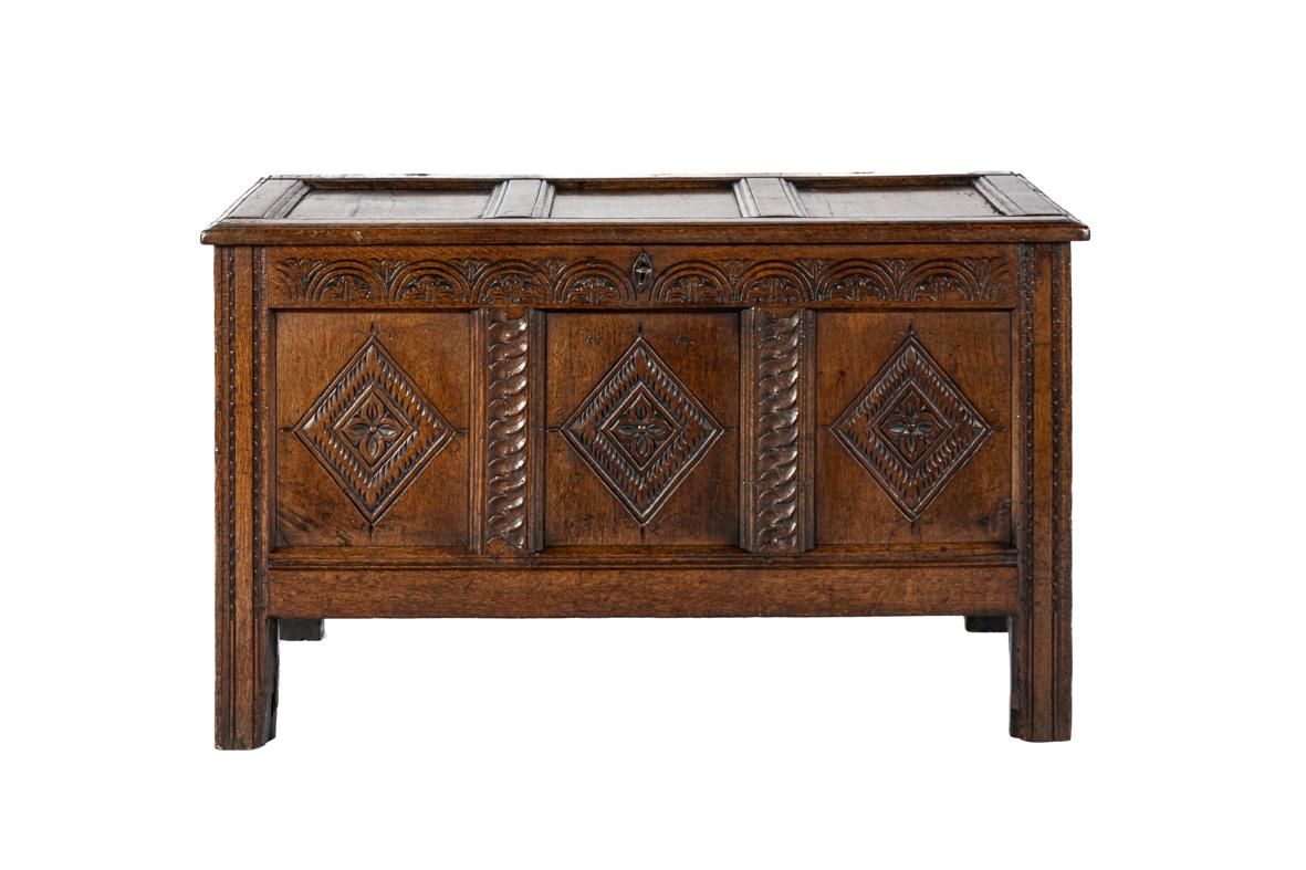 Renaissance Antique early 18th century English warm brown chest or trunk with rich carvings For Sale