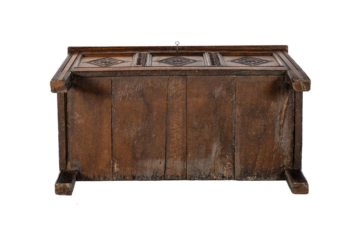 Oak Antique early 18th century English warm brown chest or trunk with rich carvings For Sale