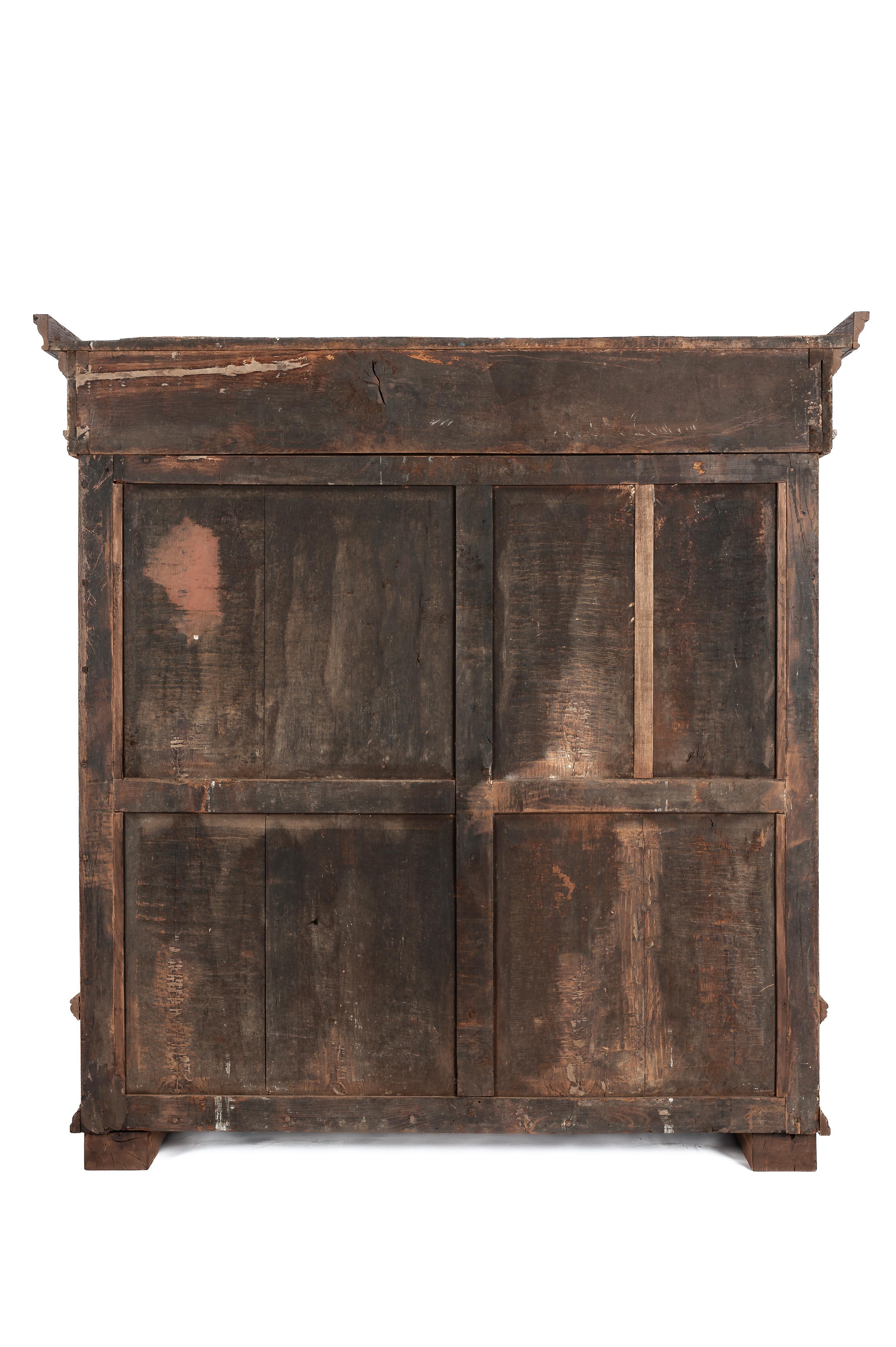Carved Antique early 18th Century German Baroque Stripped Oak Two-Door Wardrobe Cabinet For Sale