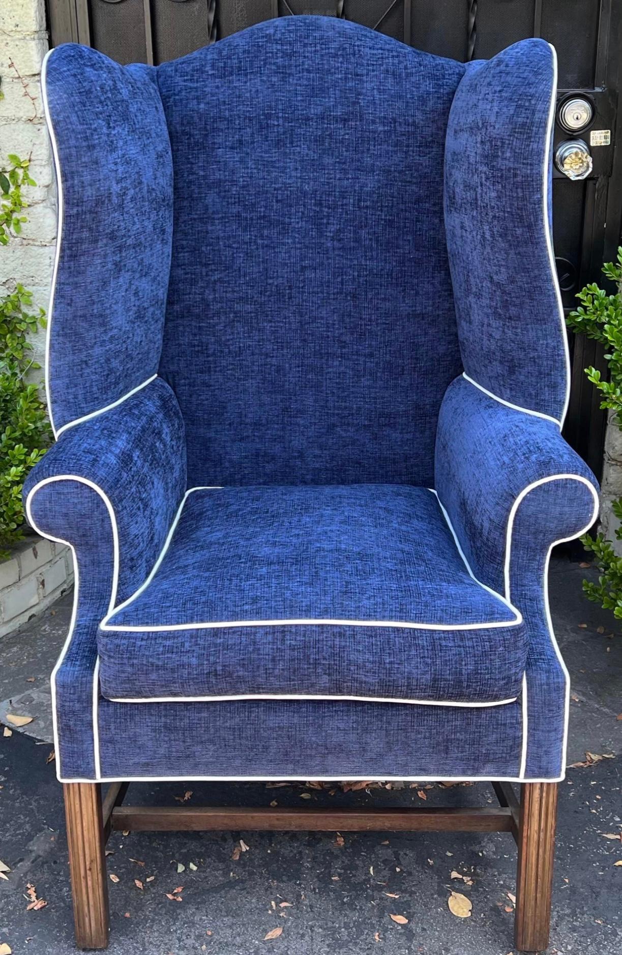 Antique Early 19c George III Petite Wingback Chair. It has been freshly upholstered in an unexpected denim velvet with white piping.