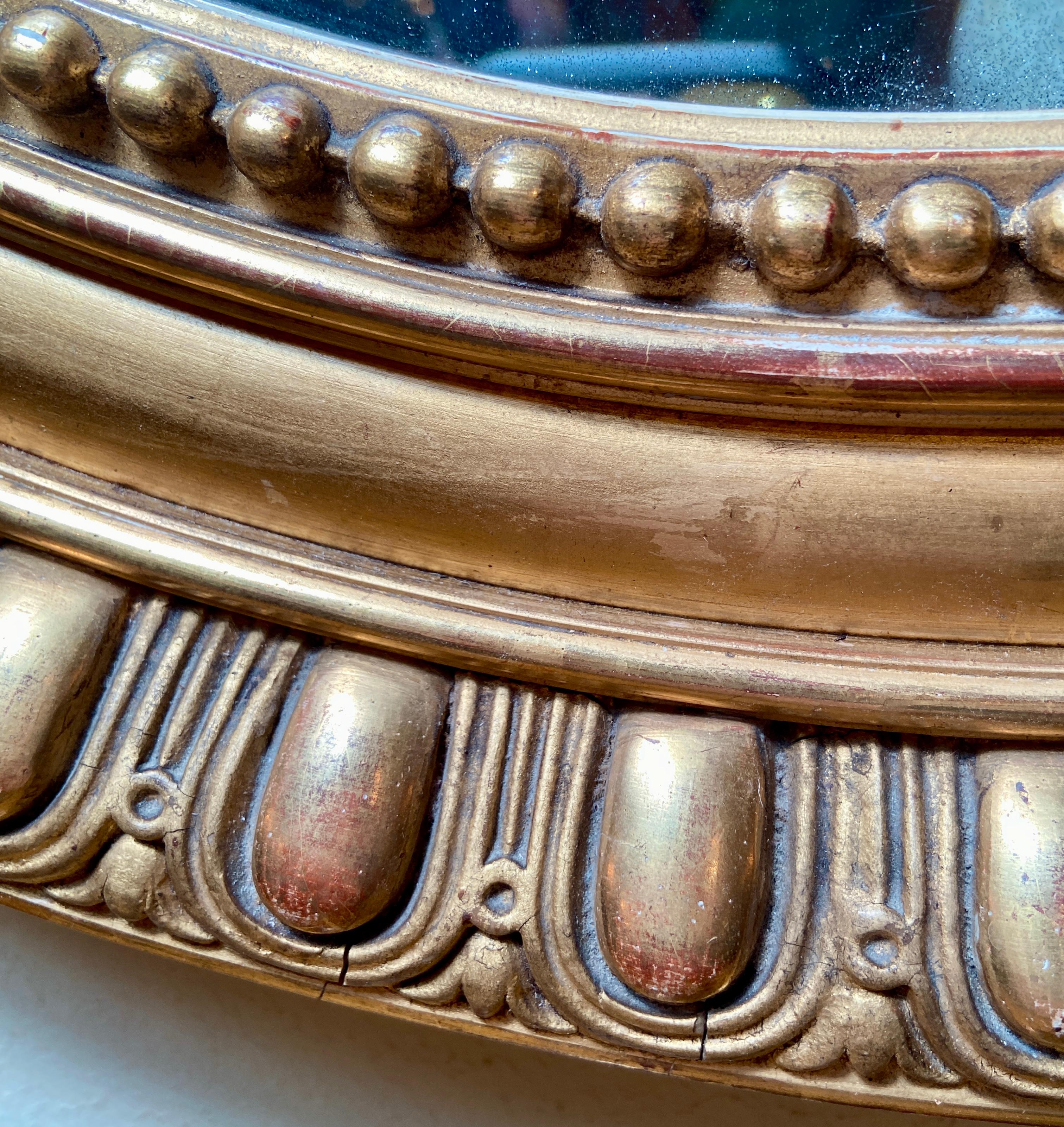 Antique Early 19th Century French Gold Leaf Oval Mirror w/ Bow & Ribbon Detail In Good Condition In New Orleans, LA
