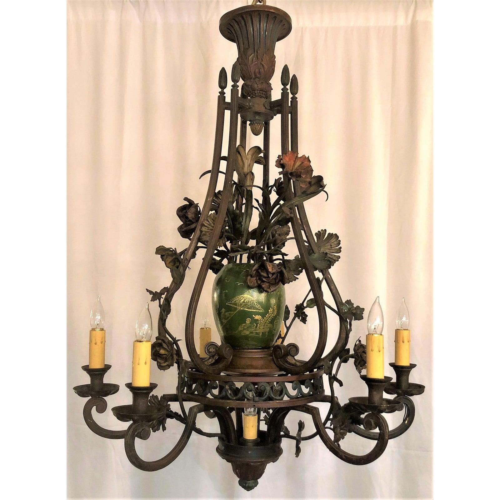 A very handsome piece with decorative touches in the flowers and leaves gracing the fixture.
 