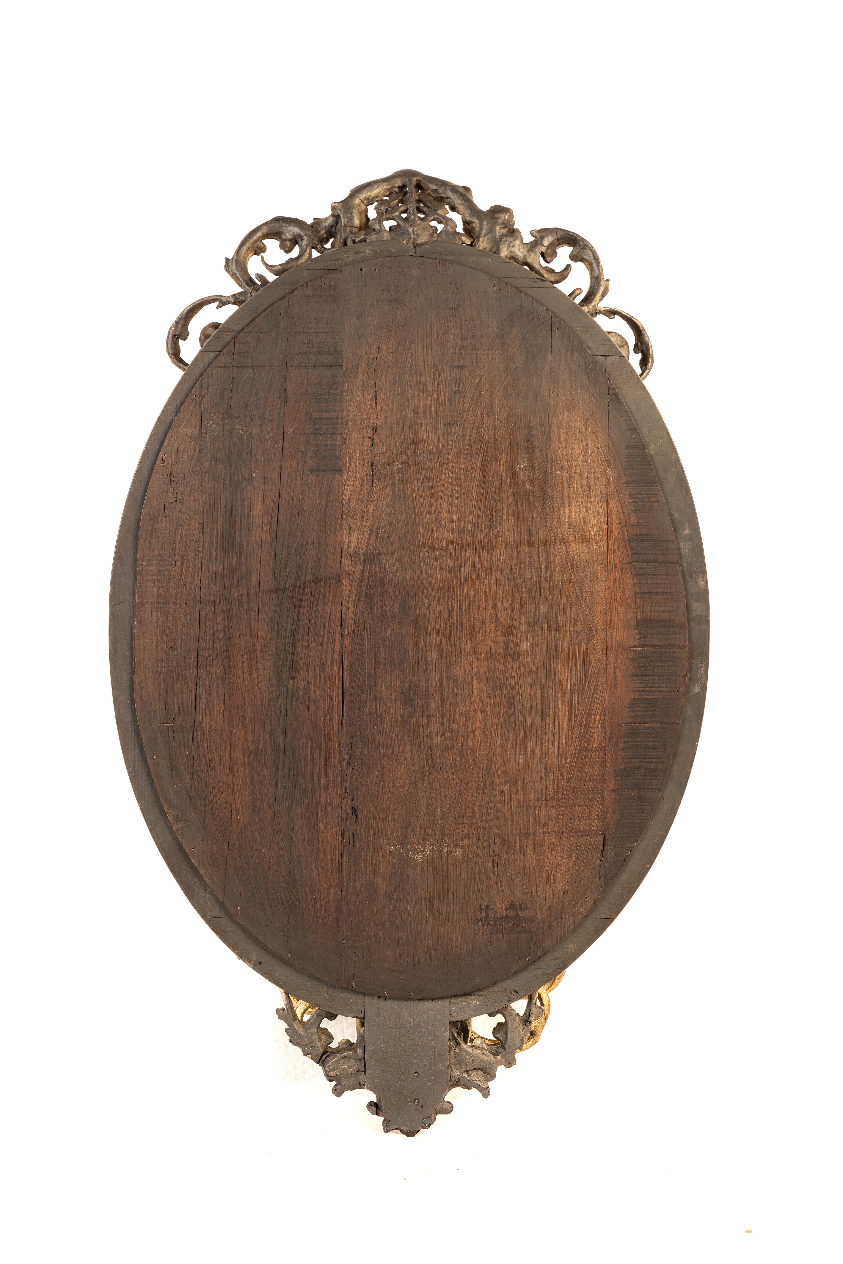 Antique early 19th century French Rococo gold oval mirror with candle holders 4
