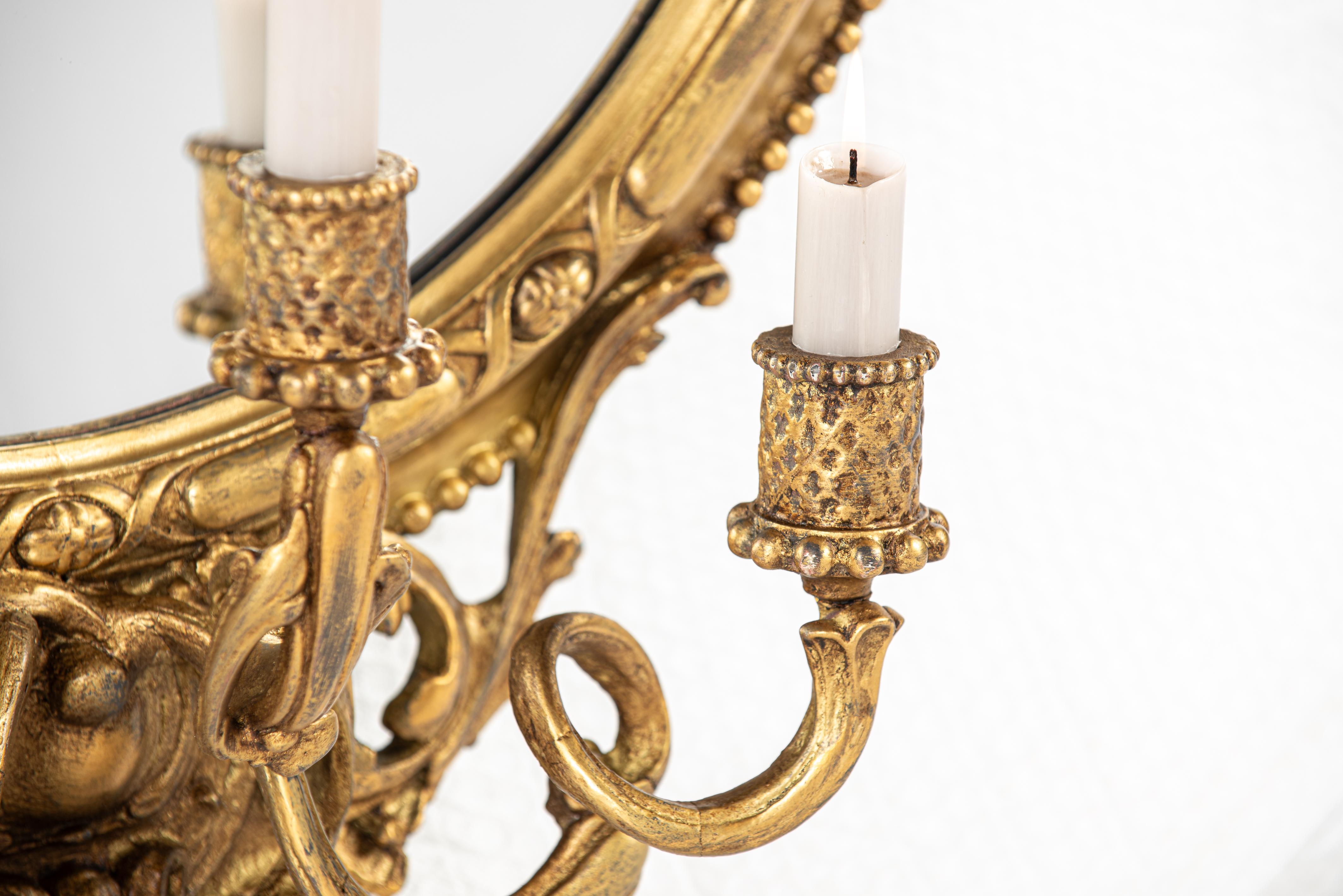 Antique early 19th century French Rococo gold oval mirror with candle holders 2