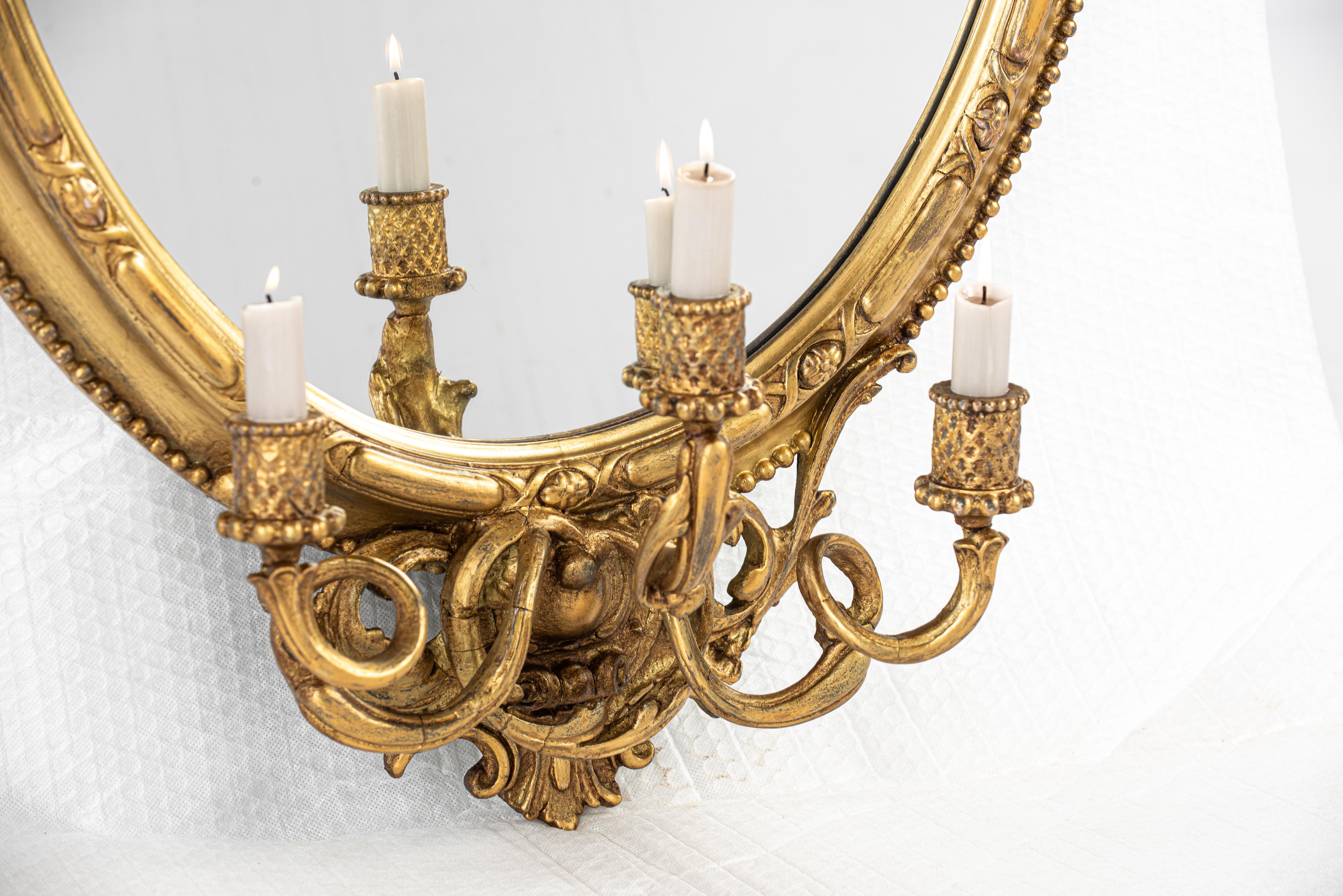 Antique early 19th century French Rococo gold oval mirror with candle holders 3