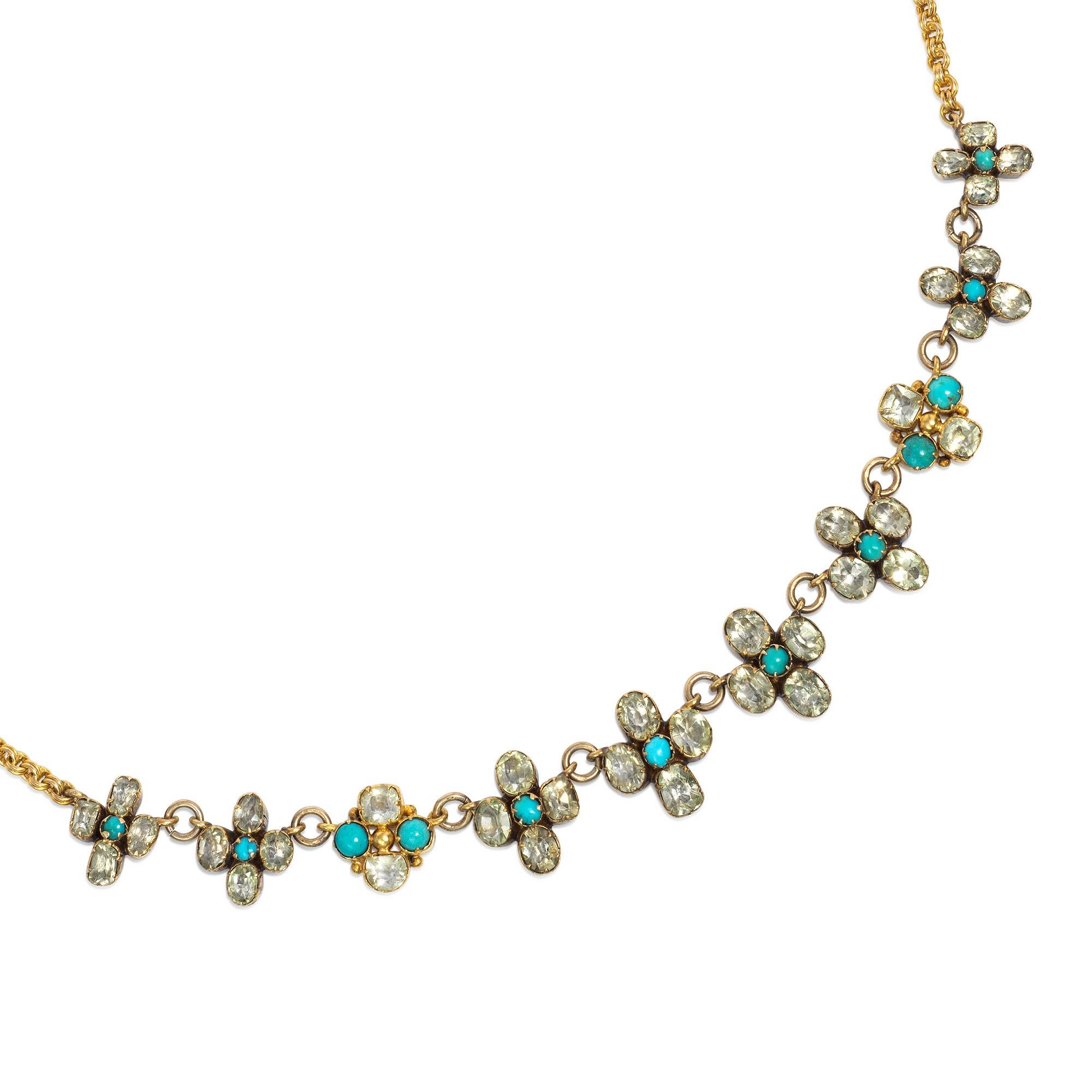 An antique Georgian period gold, chrysoberyl, and turquoise necklace comprising graduated quatrefoil links of close-backed chrysoberyl and turquoise florets on a chain, completed by a chrysoberyl and turquoise floret clasp, in 18k.  With antique