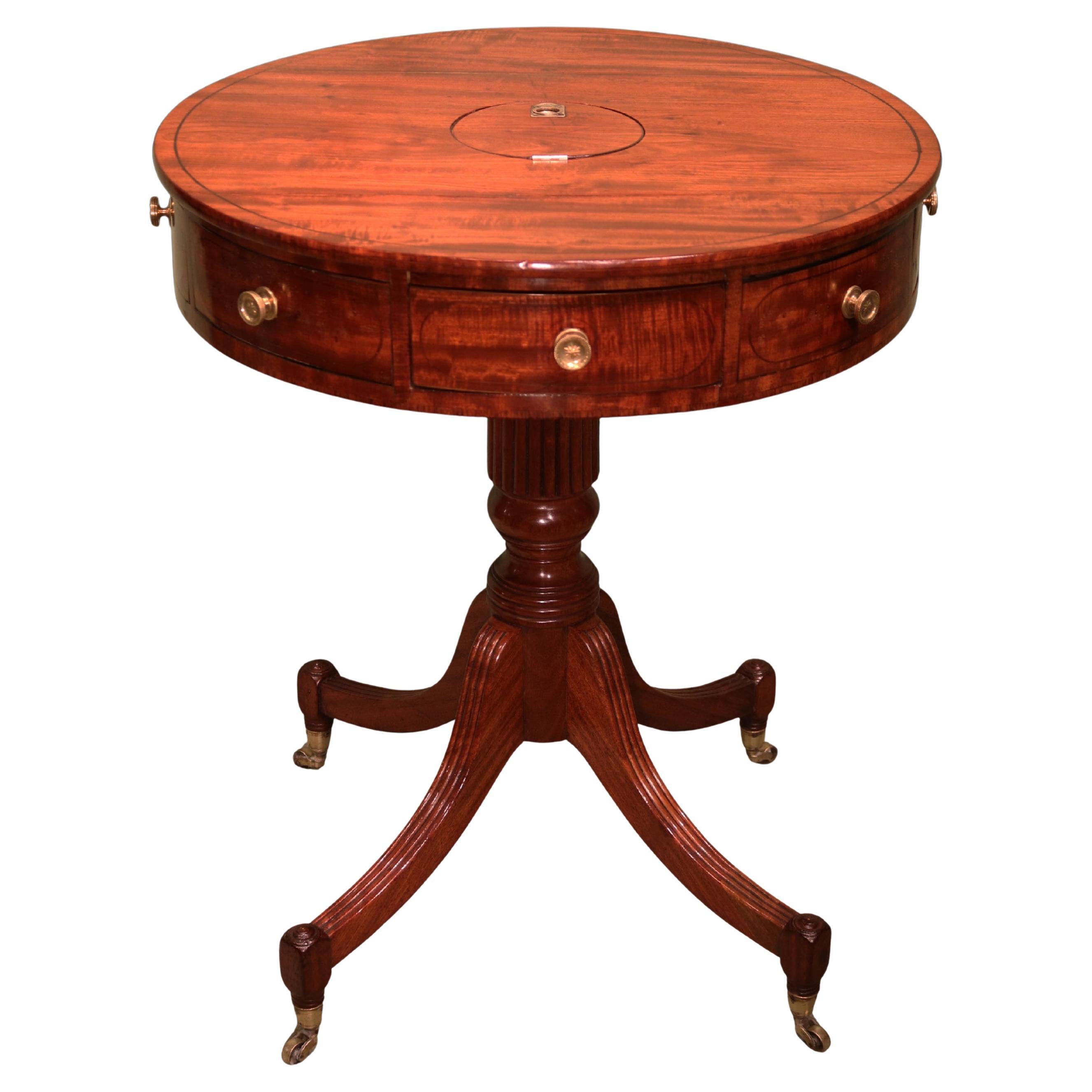 Antique early 19th century mahogany drum table