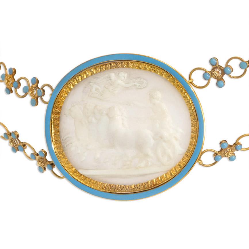 An antique Neoclassical shell cameo and gold necklace embellished with blue enamel, featuring double strands of rosette-shaped links adjoining five graduated finely carved shell cameos depicting classical and mythological figures, including Apollo