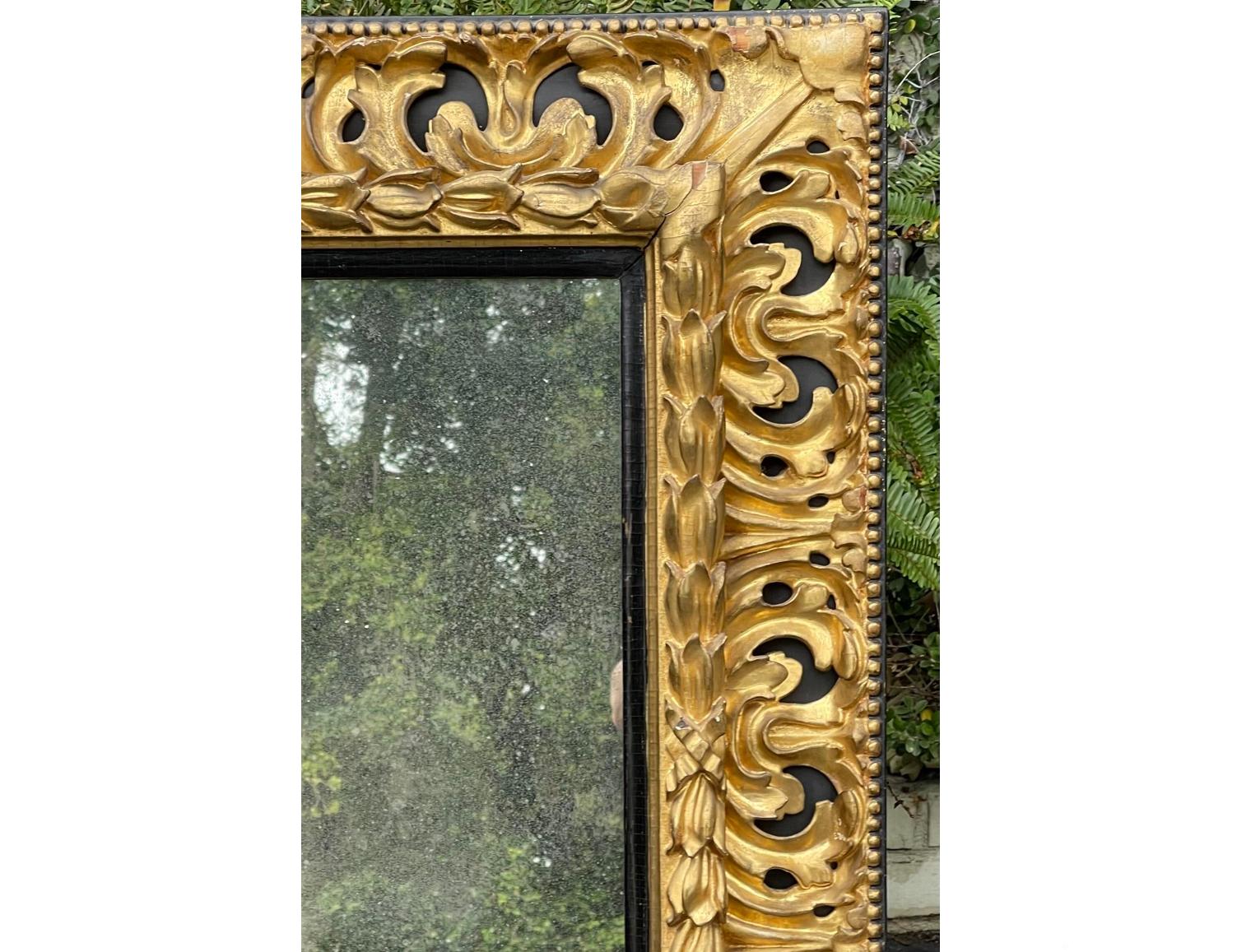 XIXe siècle Miroir antique Regency Empire en bois doré et ébène du début du 19e siècle en vente