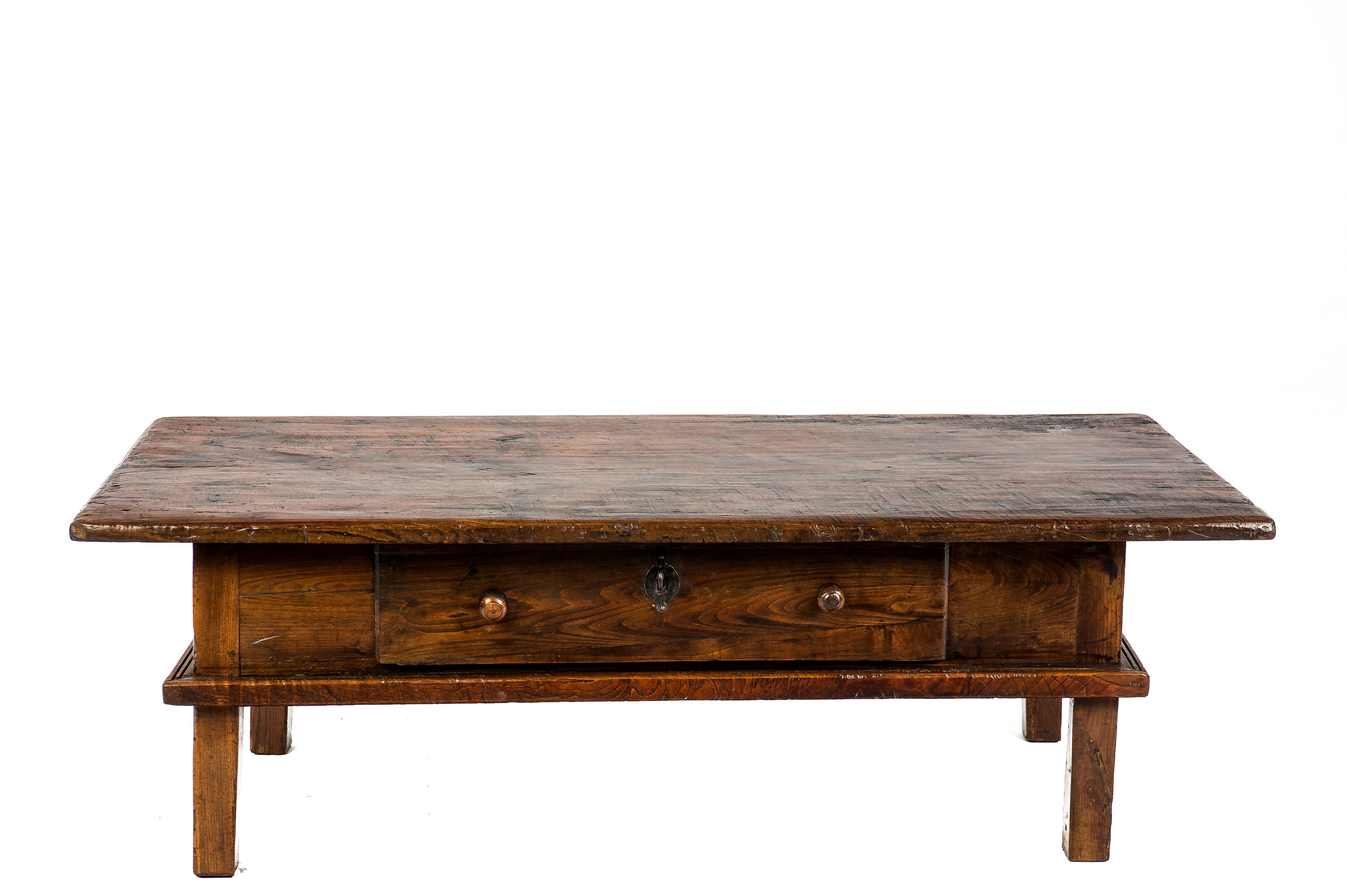 This beautiful warm brown color rustic coffee table or low table originates in Spain and dates circa 1820. The table has a great top that was made from a single board of solid chestnut wood 1,18 inches thick. The top has a beautiful grain pattern