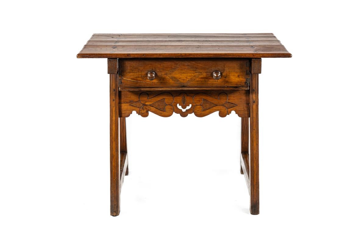 Carved Antique early 19th century Spanish honey color pine Side table with drawer For Sale