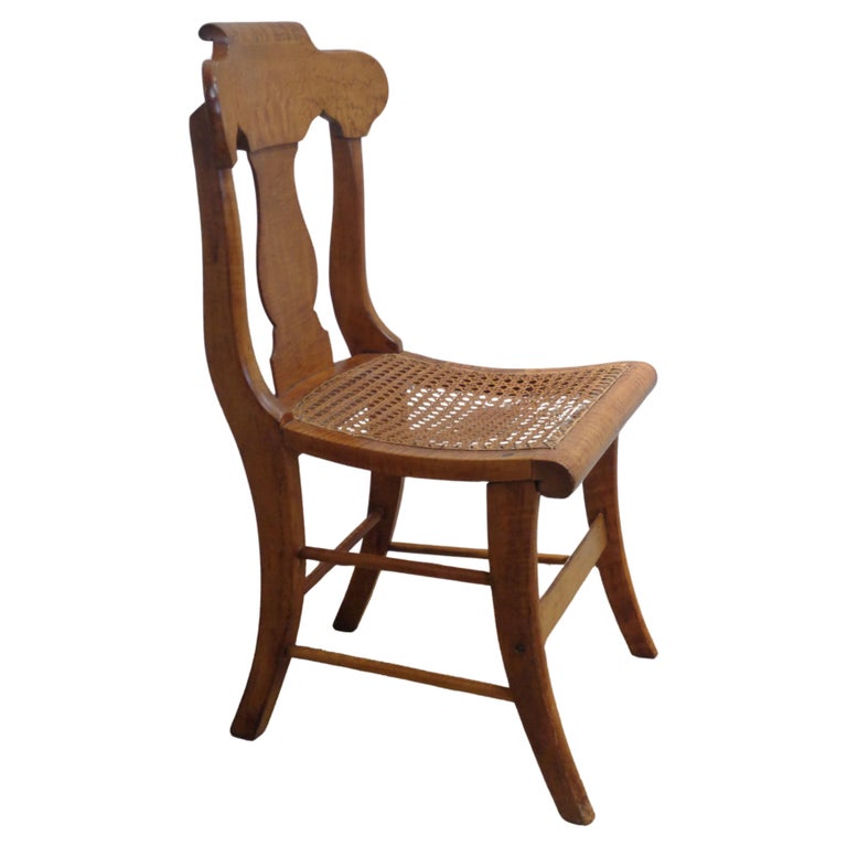 An American Tiger Maple Sheraton Settee with Cane Seat An American Tiger Maple Sheraton Settee with Cane Seat