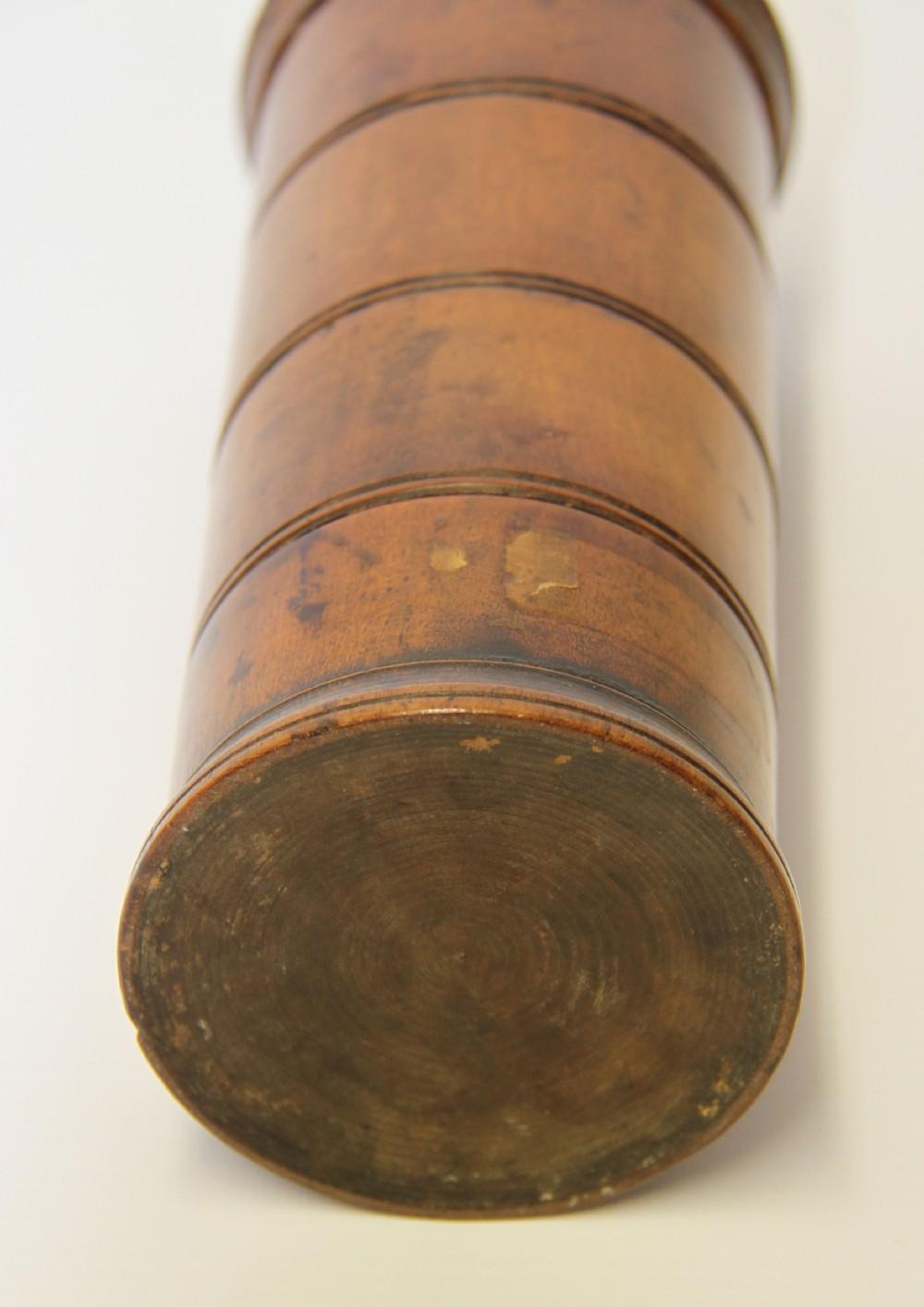 A turned walnut spice container in three sections which screws together plus a lid. This lovely piece has great tactile feel with fantastic colour and patination,
circa 1830.

  