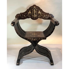 Antica poltrona veneziana Savonarola del primo Ottocento in legno di palissandro