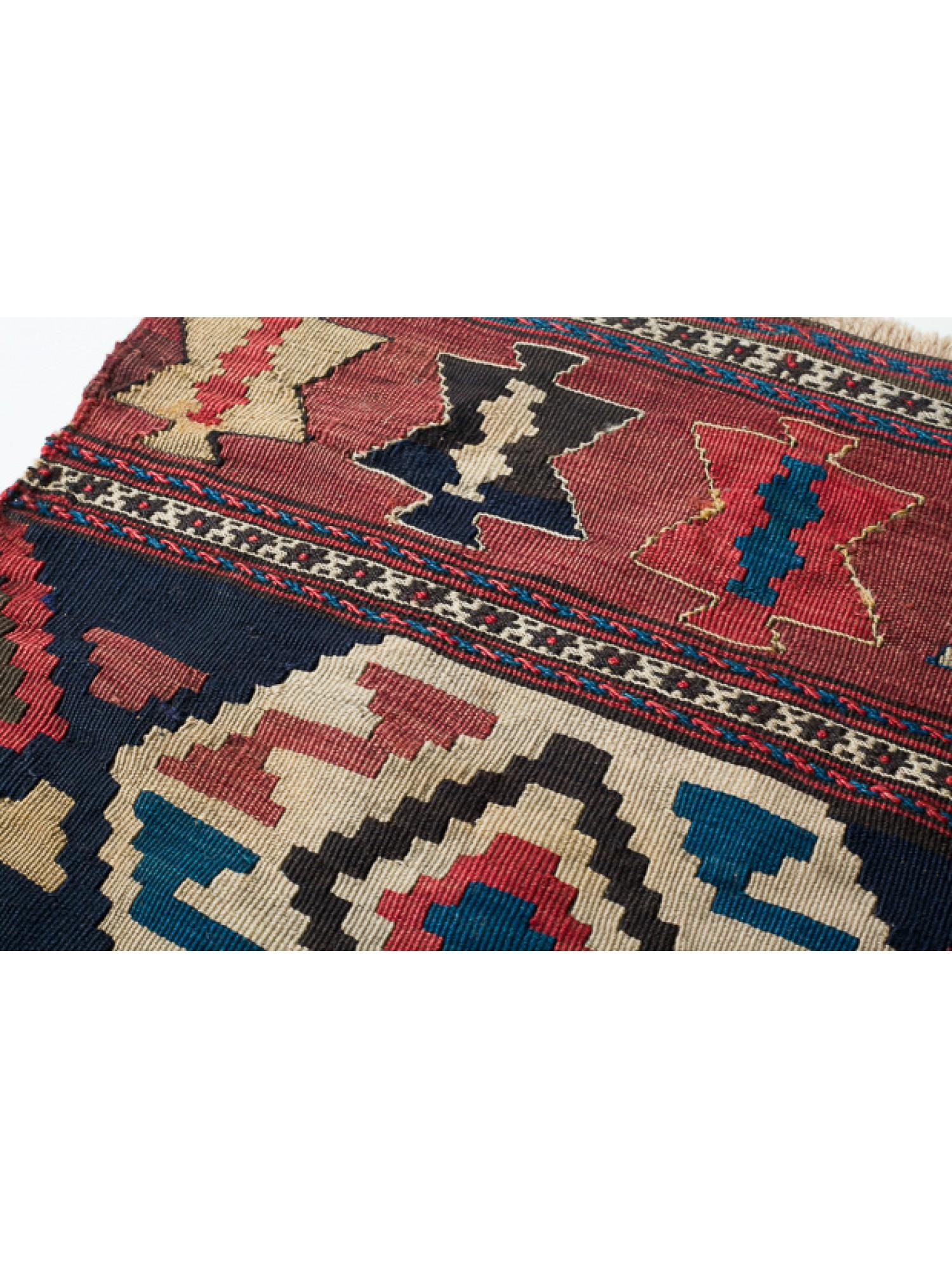 This is an antique collectible Early 20th century Kilim Woven Cradle Part from the Caucasus region with a rare and beautiful color composition.

Of the four countries that make up the Caucasus, Azerbaijan produces the most kilims, and the land has