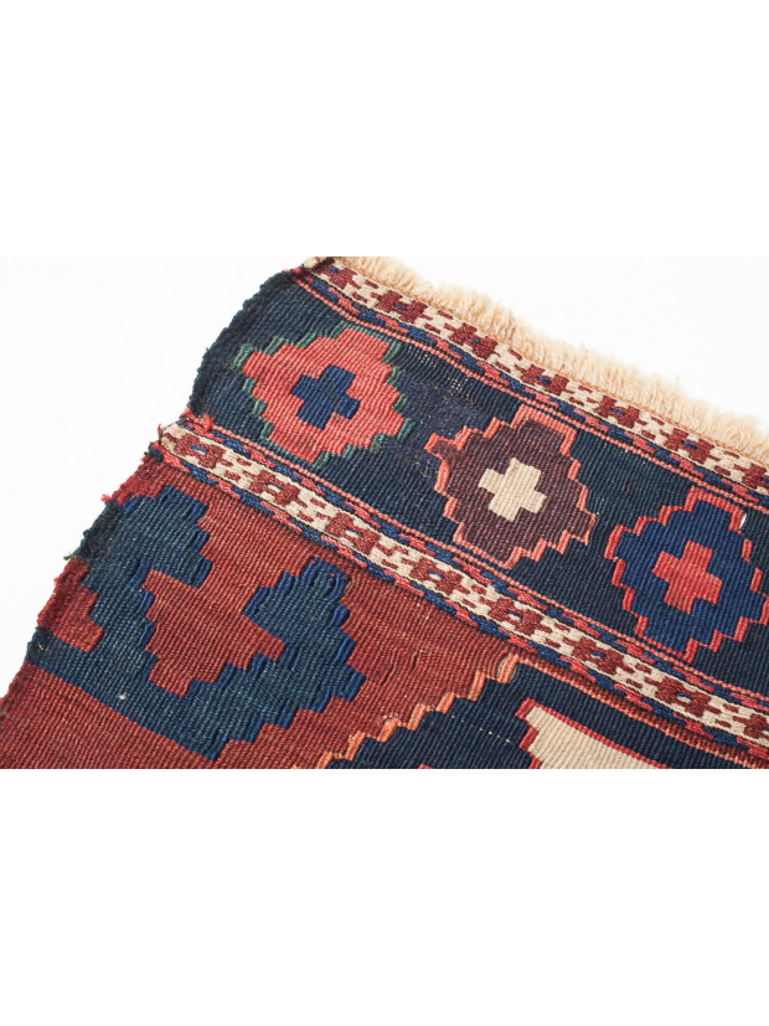 This is an antique collectible Early 20th century Kilim Woven Cradle Part from the Caucasus region with a rare and beautiful color composition.

Of the four countries that make up the Caucasus, Azerbaijan produces the most kilims, and the land has