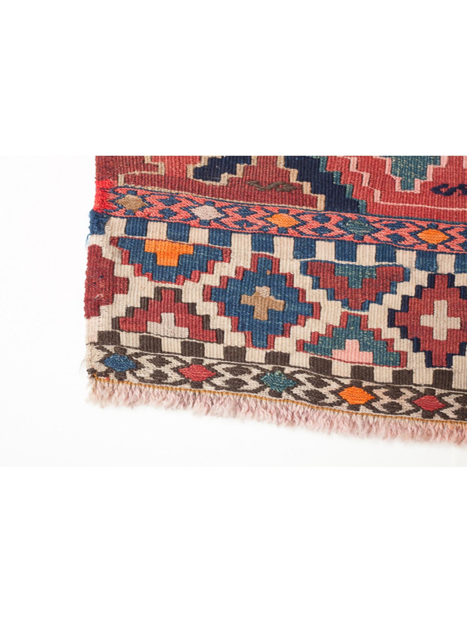 This is an antique collectible square Early 20th Century Kilim Woven Cradle Part from the Caucasus region with a rare and beautiful color composition.

Of the four countries that make up the Caucasus, Azerbaijan produces the most kilims, and the